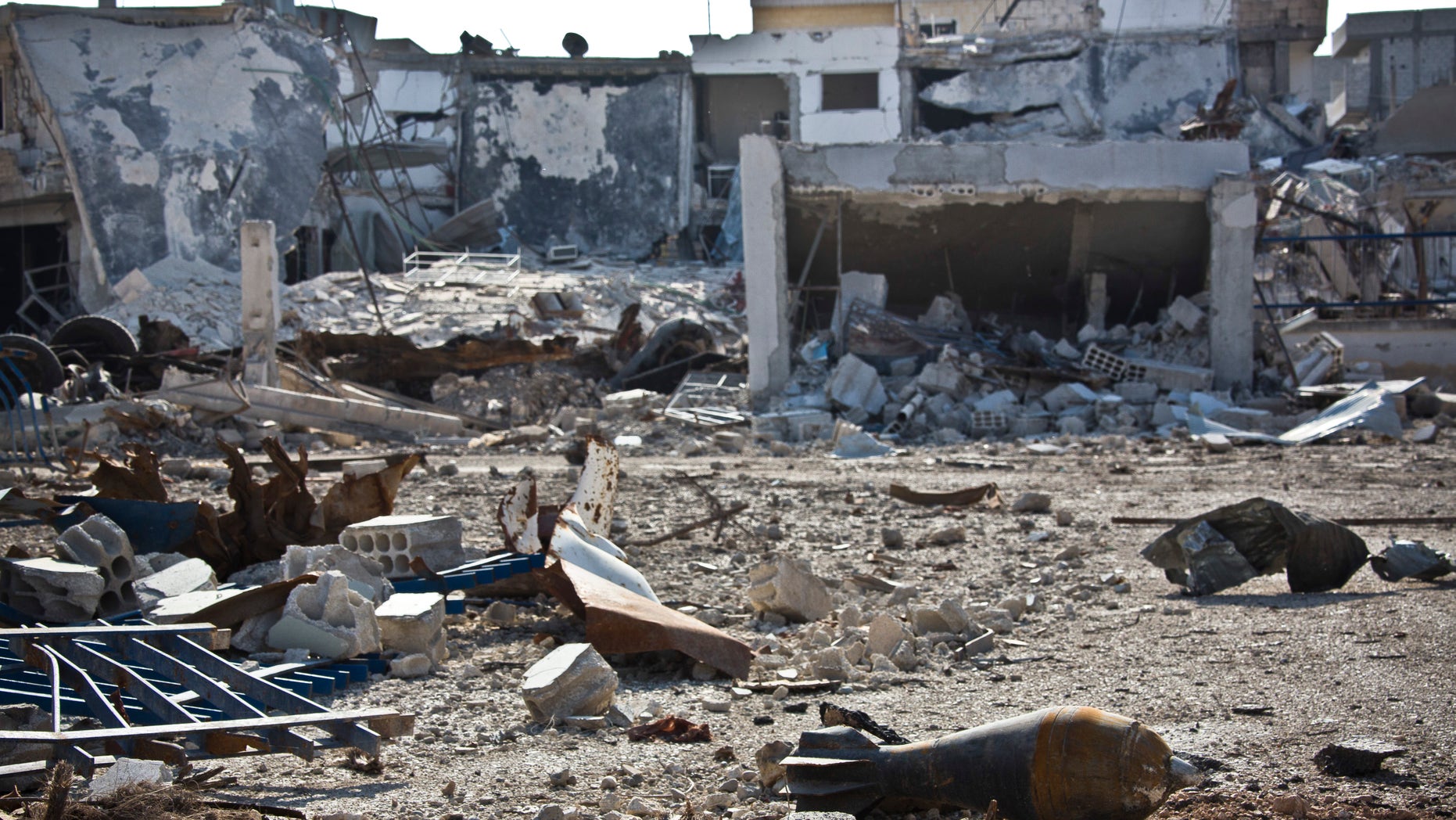 Nov. 19, 2014 - Mortars litter the streets in Kobani, Syria, where Kurdish fighters backed by small numbers of Iraqi peshmerga forces and Syrian rebels, are locked in a battle against the Islamic State group, who swept into their town in mid-September. Syria's vice foreign minister denied Monday that his government ever used chemical weapons or chlorine during the country's brutal civil war and warned that terror groups are using such weapons.