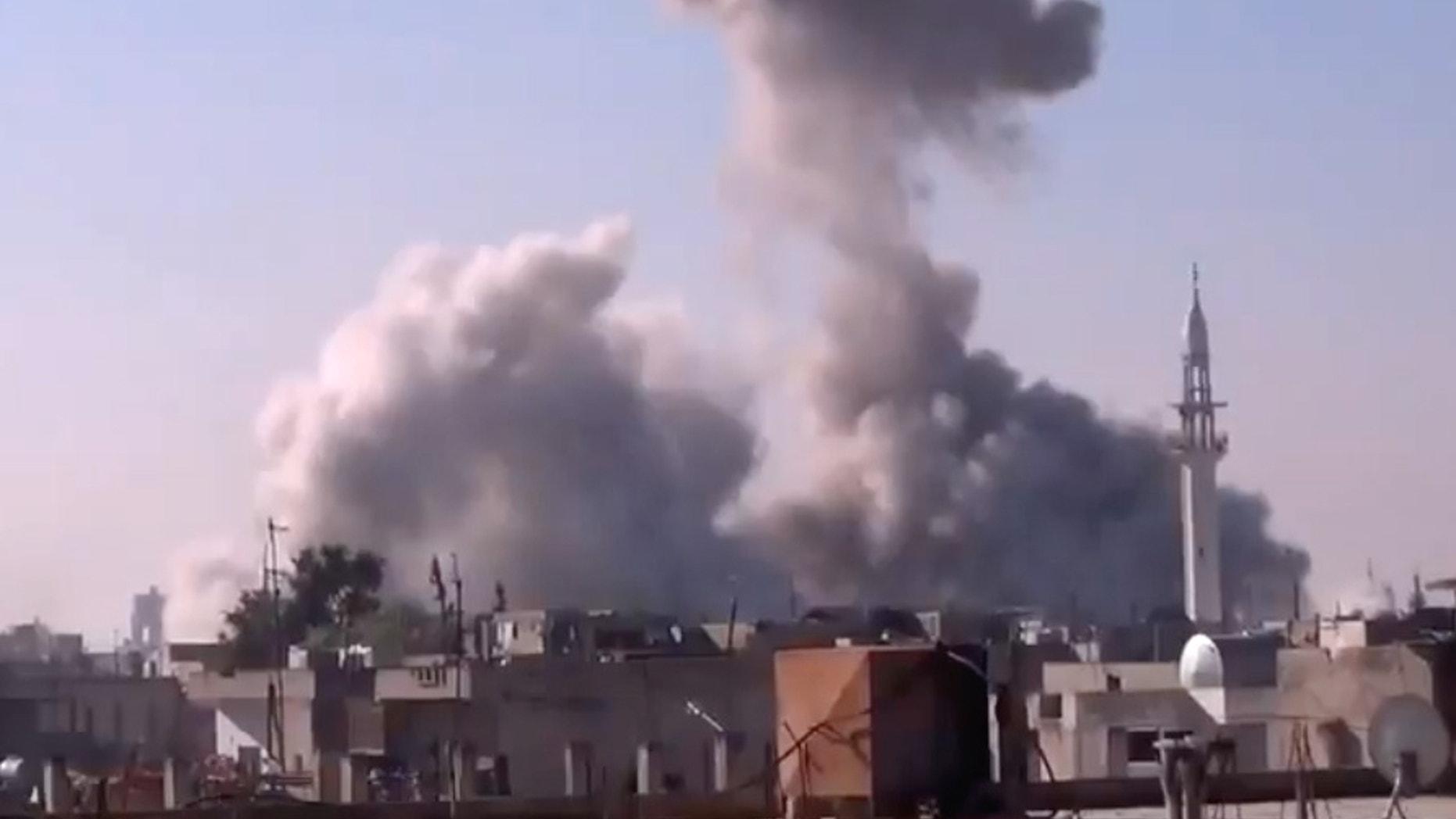Dec. 27, 2012 - In this image taken from video obtained from the Shaam News Network, smoke rises from buildings from heavy shelling in Homs, Syria.