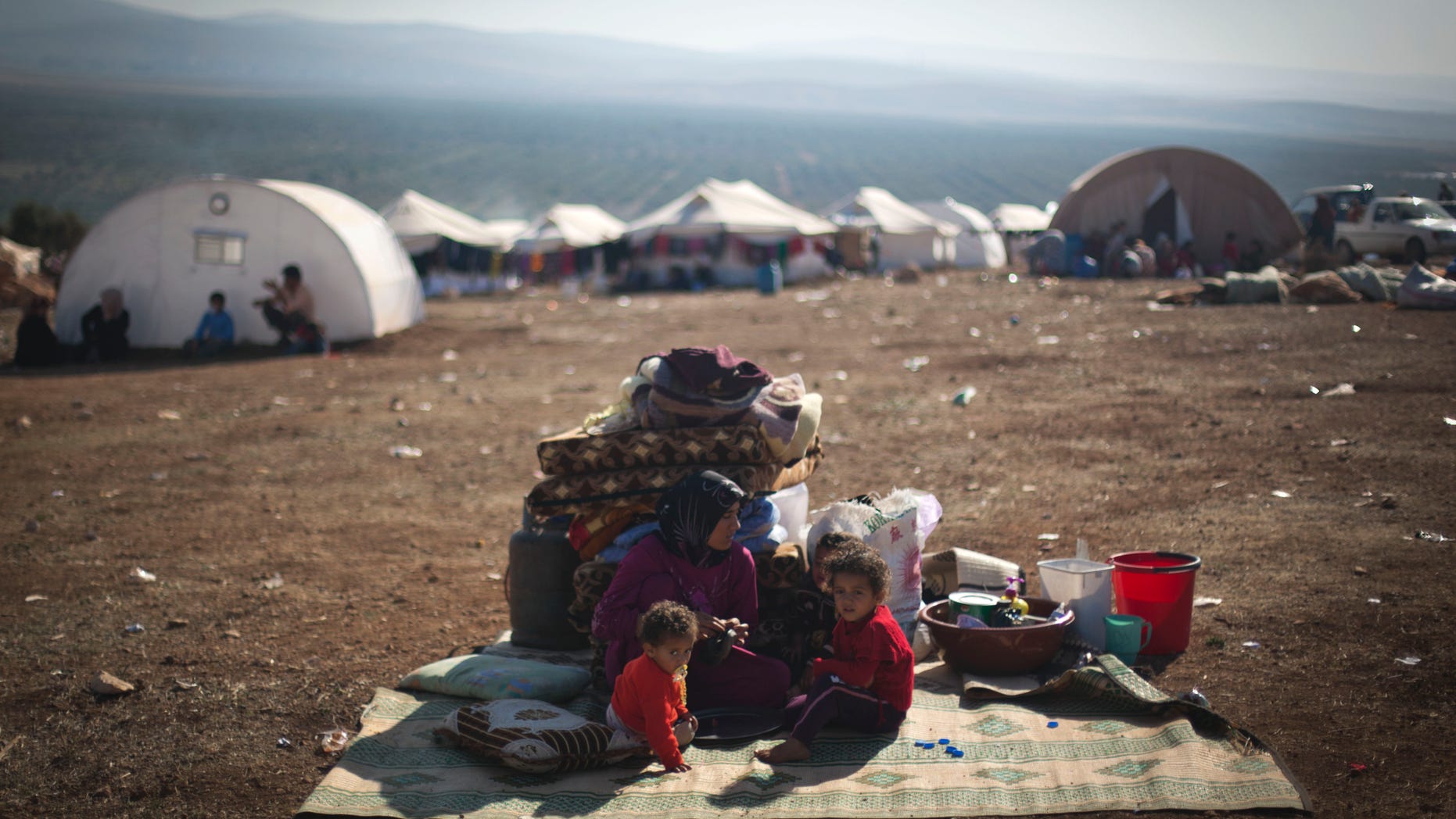 Nov. 7, 2012 - Syrian family who fled from the violence in their village, at a displaced camp, in the Syrian village of Atma.