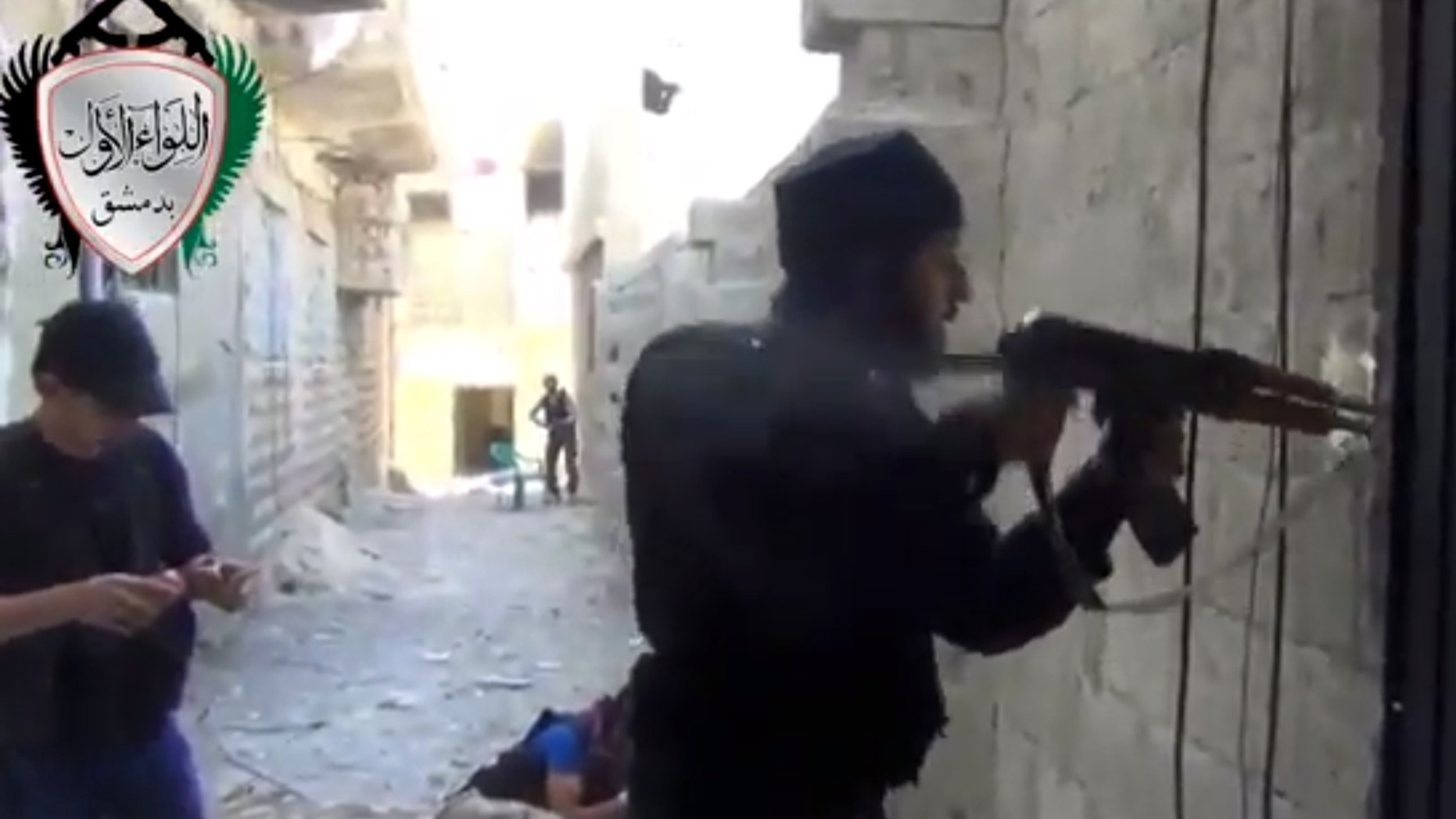 Friday, May 3, 2013 - Image taken from video obtained from the Ugarit News shows Syrian rebels clashing with government forces in Damascus, Syria.