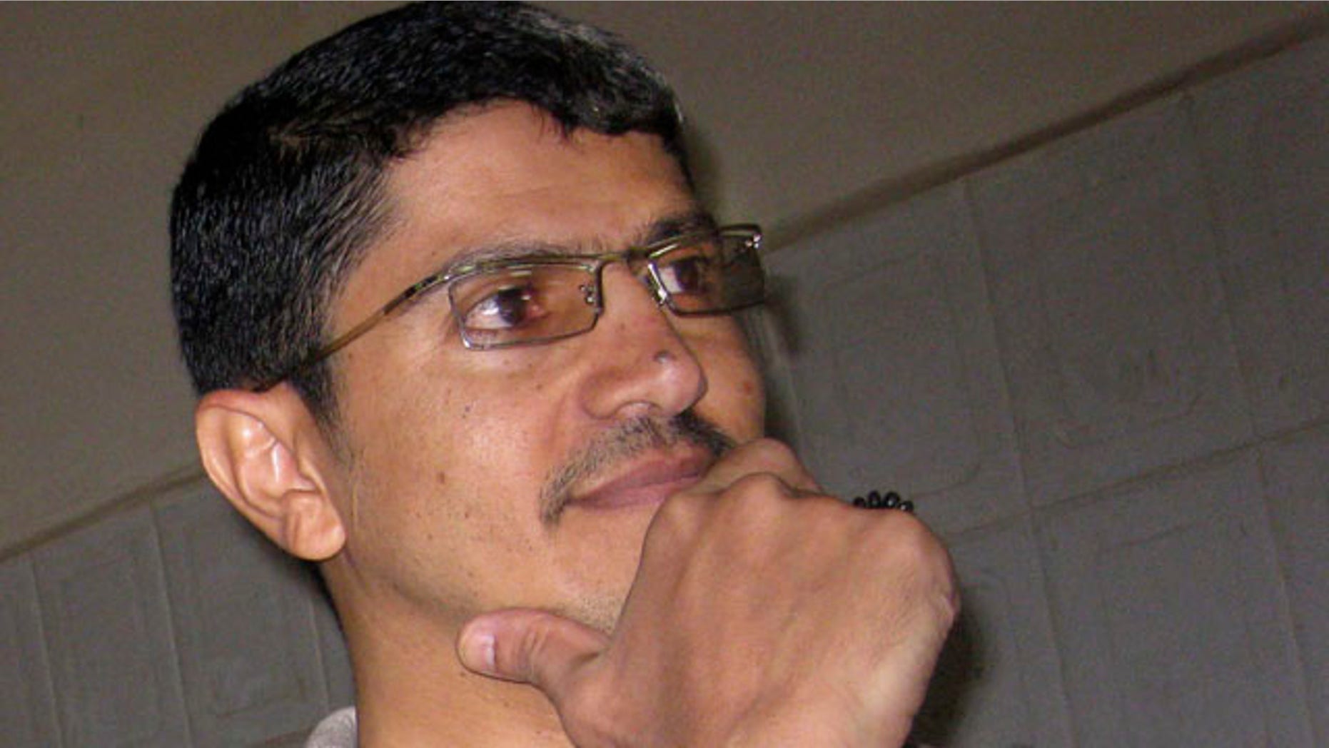 Oct. 26: Yemeni journalist Abdelela Shayie appears at the state security court in San'a, Yemen. A Yemeni prosecutor indicted Shayie for charges that include assisting the American-born cleric Anwar al-Awlaki, who the United States has put on a kill-or-capture list accusing him of serving Al Qaeda.