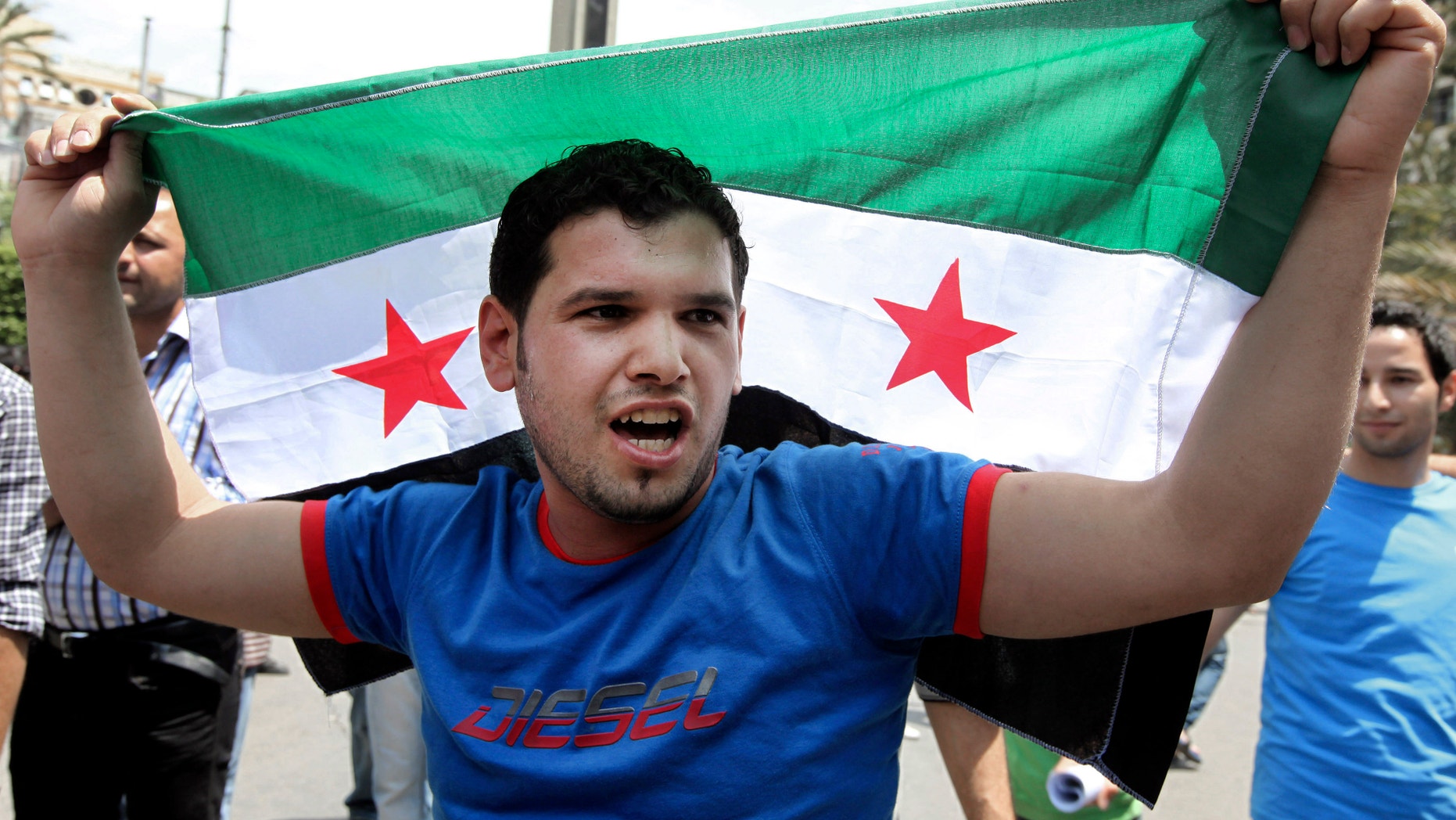 May 18, 2012: An anti-Syrian regime protester, chants slogans during a demonstration to show solidarity with the Syrian revolution in Beirut, Lebanon.
