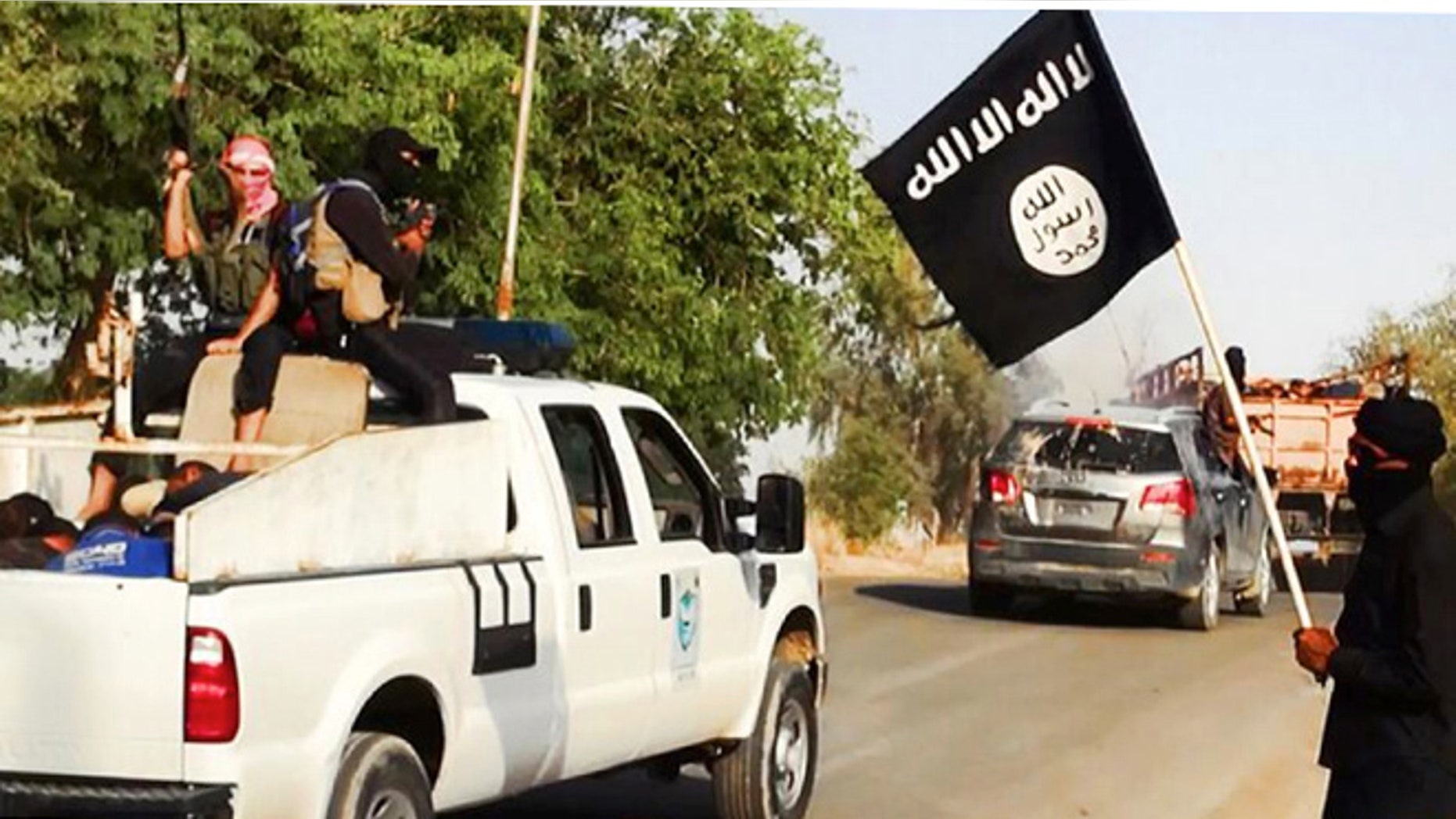 June 14, 2014: Image on a militant website that appears to show militants from Islamic State of Iraq and the Levant near Tikrit, Iraq.