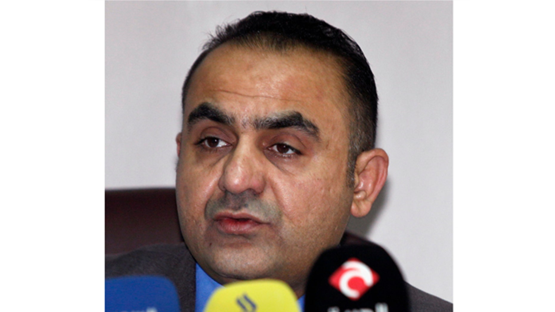Feb. 16, 2012- Abdul-Sattar Bayrkdar, Iraqi Supreme Judicial Council spokesman, speaks to reporters in Baghdad, Iraq. An Iraqi investigation panel says the country's Sunni vice president and his employees were behind years of deadly attacks on security officials and Shiite pilgrims.
