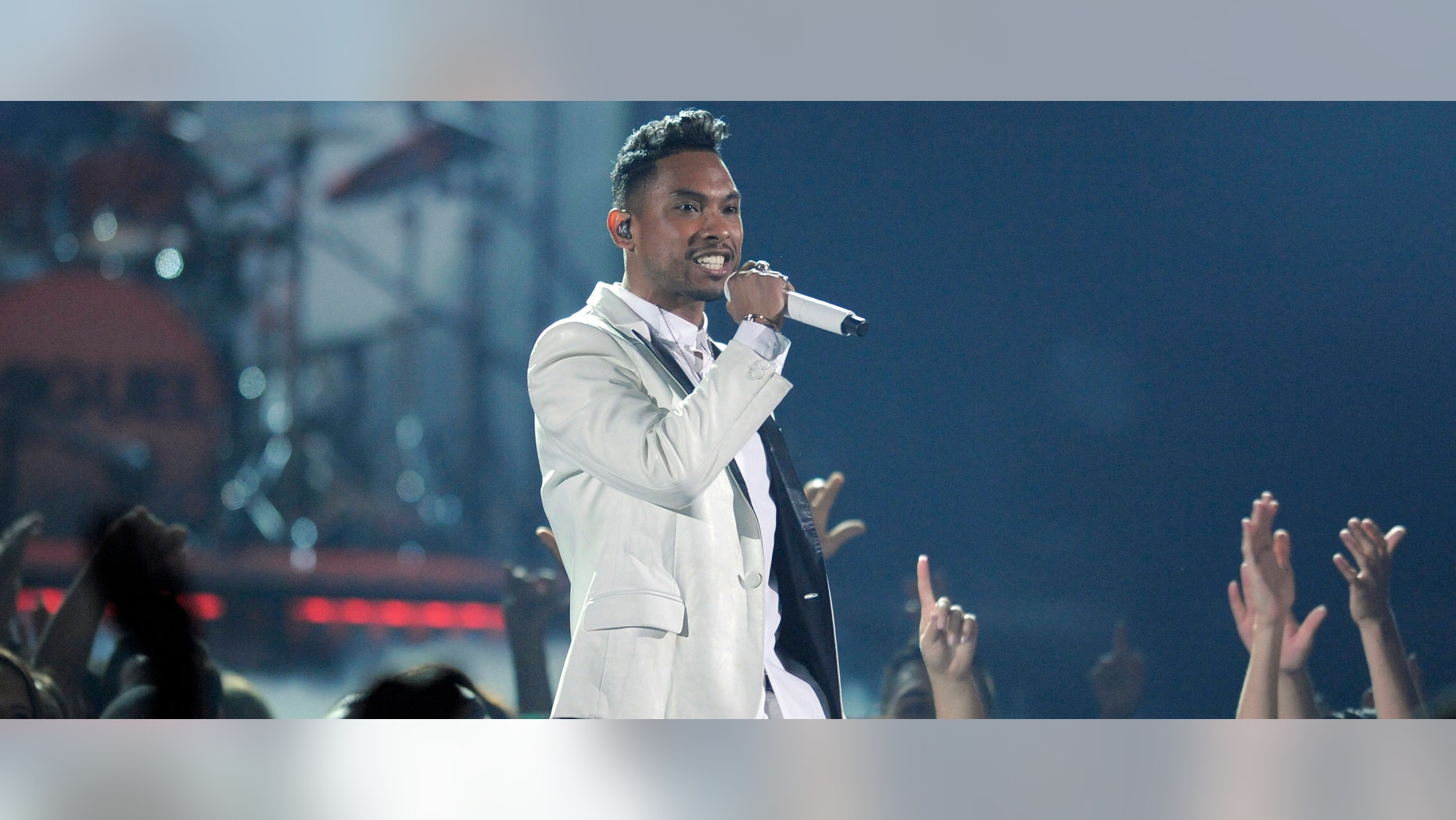 Miguel performs at the Billboard Music Awards at the MGM Grand Garden Arena on Sunday, May 19, 2013 in Las Vegas. (Photo by Chris Pizzello/Invision/AP)