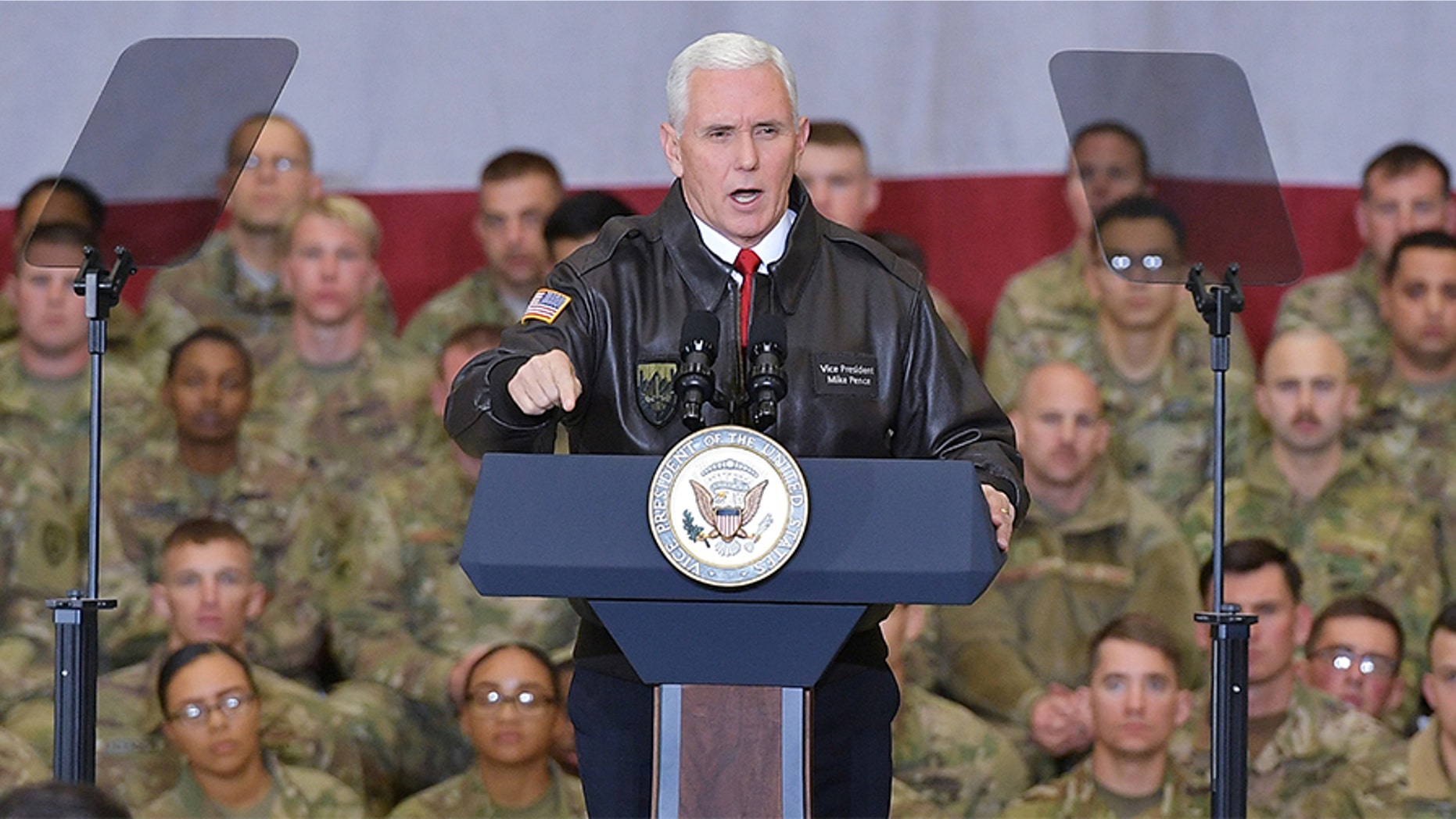 U.S. Vice President Mike Pence speaks to troops in a hangar at Bagram Air Field in Afghanistan on December 21, 2017.