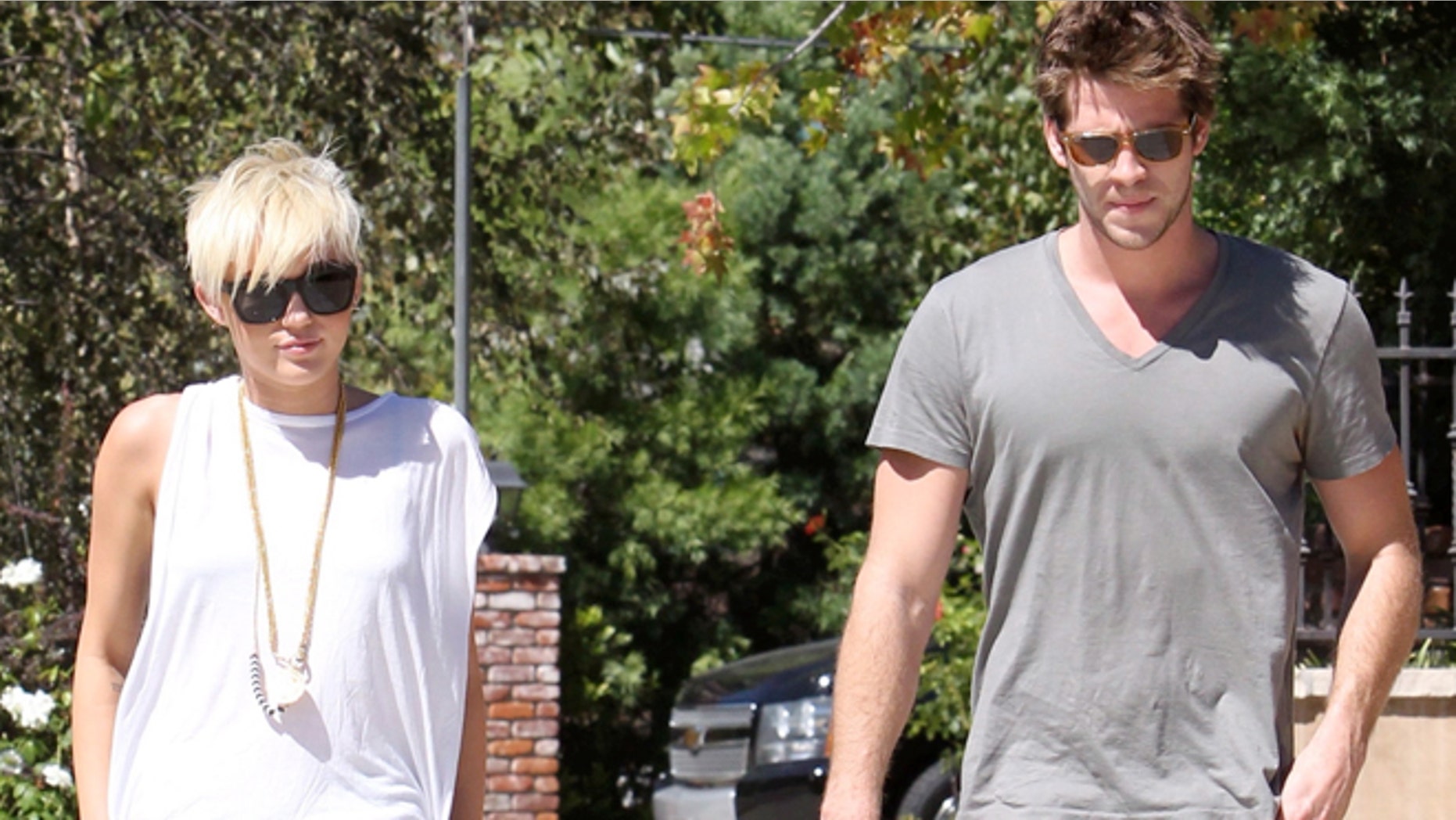 Miley Cyrus and Liam Hemsworth visit a friend in Pasadena. Sunday, September 2, 2012.