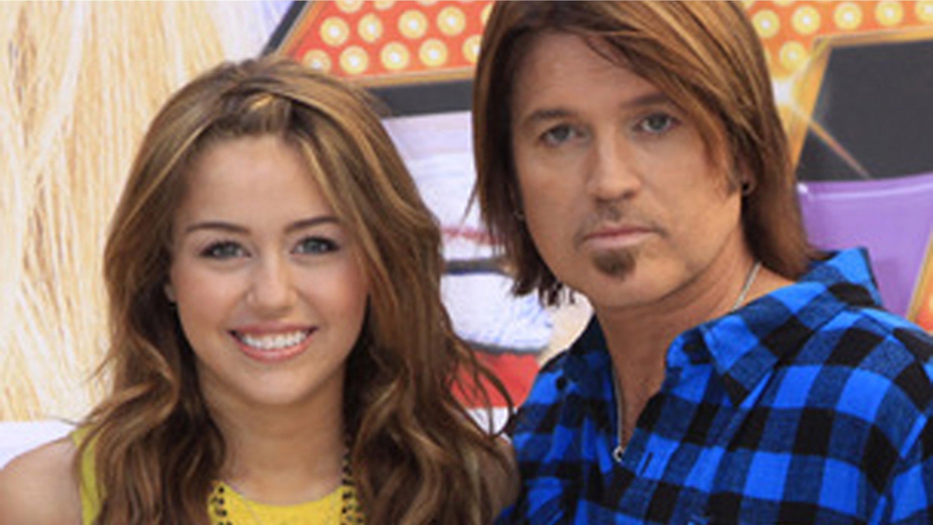 April 21, 2009: Miley Cyrus and her dad Billy Ray Cyrus their movie, "Hannah Montana: The Movie" in Madrid.
