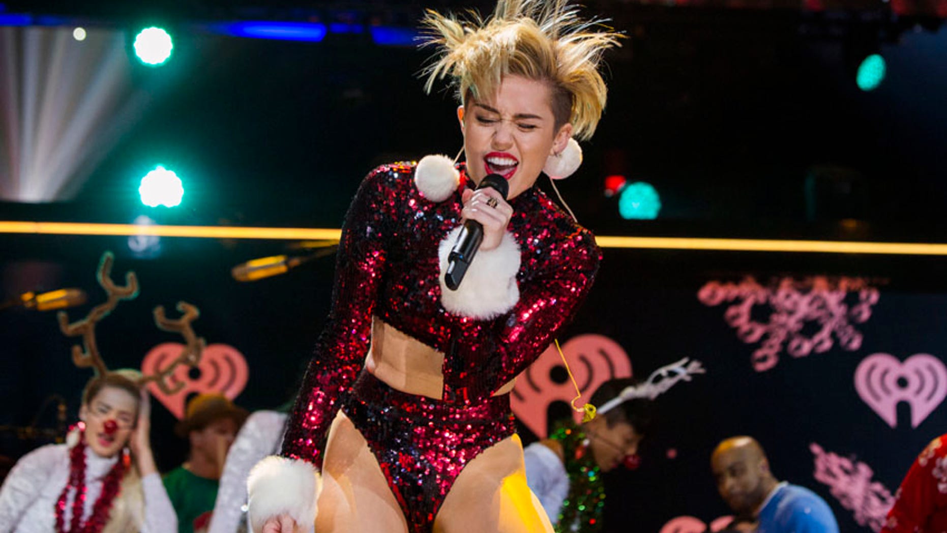 FILE -- December 13, 2013: Singer Miley Cyrus performs during the 2013 Z100 Jingle Ball in New York.