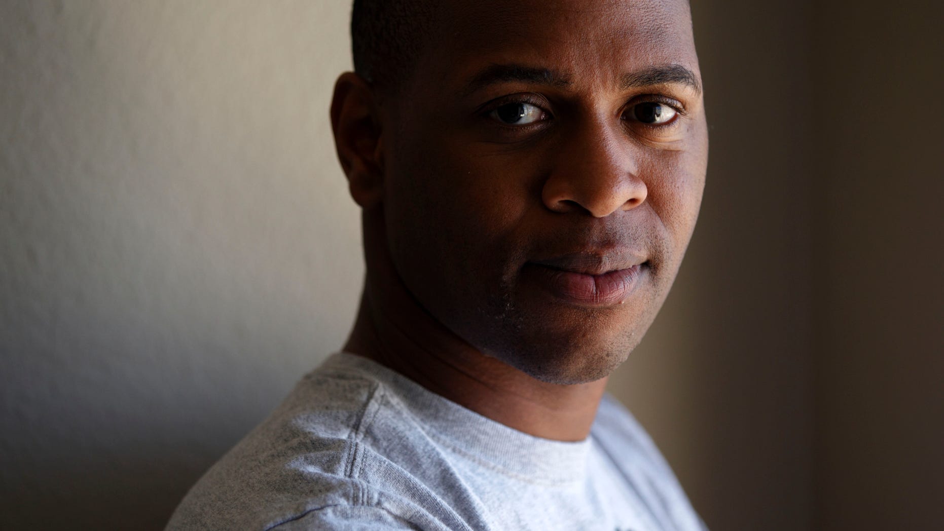 July 15: Navy medical corpsman Andrew James, who is now in the U.S. Navy Reserve poses for a picture in San Diego. Gay service members from Army soldiers to Air Force officers are planning to celebrate the official end of the military's 17-year policy that forced them to hide their sexual orientation with another official act - marriage.