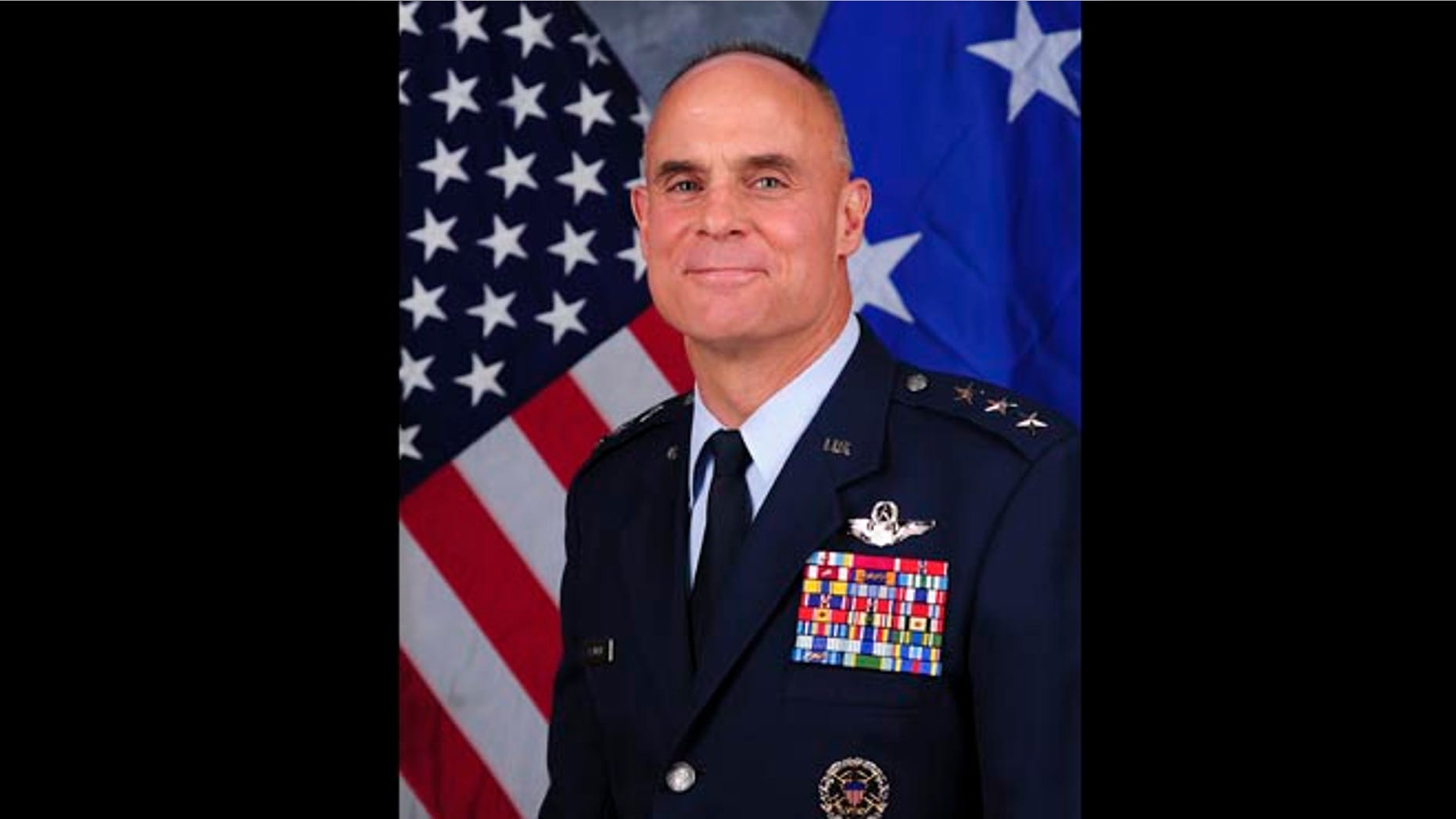 This undated file photo provided by the U.S. Air Force shows Lt. Gen. Craig Franklin, who overturned the sexual assault conviction of Lt. Col. James Wilkerson. The Air Forces decision to transfer Wilkerson to a Tucson military base has outraged the family of Kimberly Hanks, the woman who made the allegations, adding to the growing criticism of the military justice system.