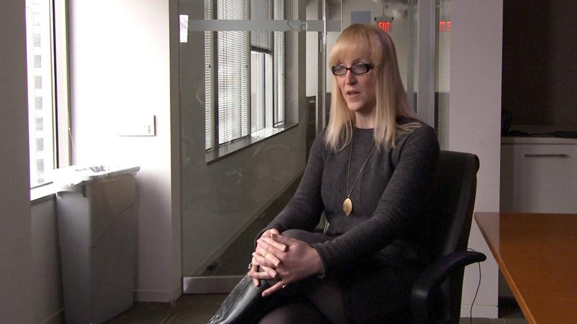 This image from video shows Allyson Robinson, policy director for an association of lesbian, gay, bisexual and transgender military personnel called Service members, Partners, and Allies for Respect and Tolerance for All, or SPARTA, during an interview with The Associated Press on Tuesday, March 24, 2015, in Washington. U.S. officials say Defense Secretary Ash Carter has gotten pushback from senior military leaders on whether the Pentagon should lift its ban on transgender people serving in the armed forces. Robinson acknowledged the issues raises challenging questions for the military. But said other nations, including Australia, Canada and Britain, have found solutions. (AP Photo/Bill Gorman)