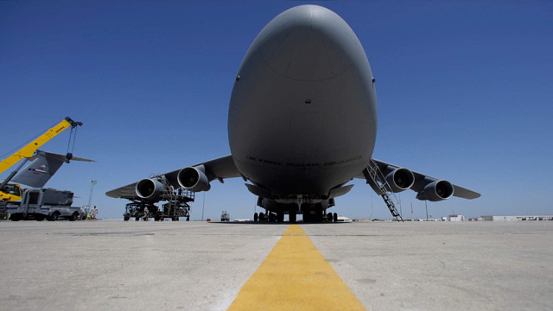 April 11, 2013: Mechanics work on a C-5A military transport aircraft at Lackland Air Force Base in San Antonio.