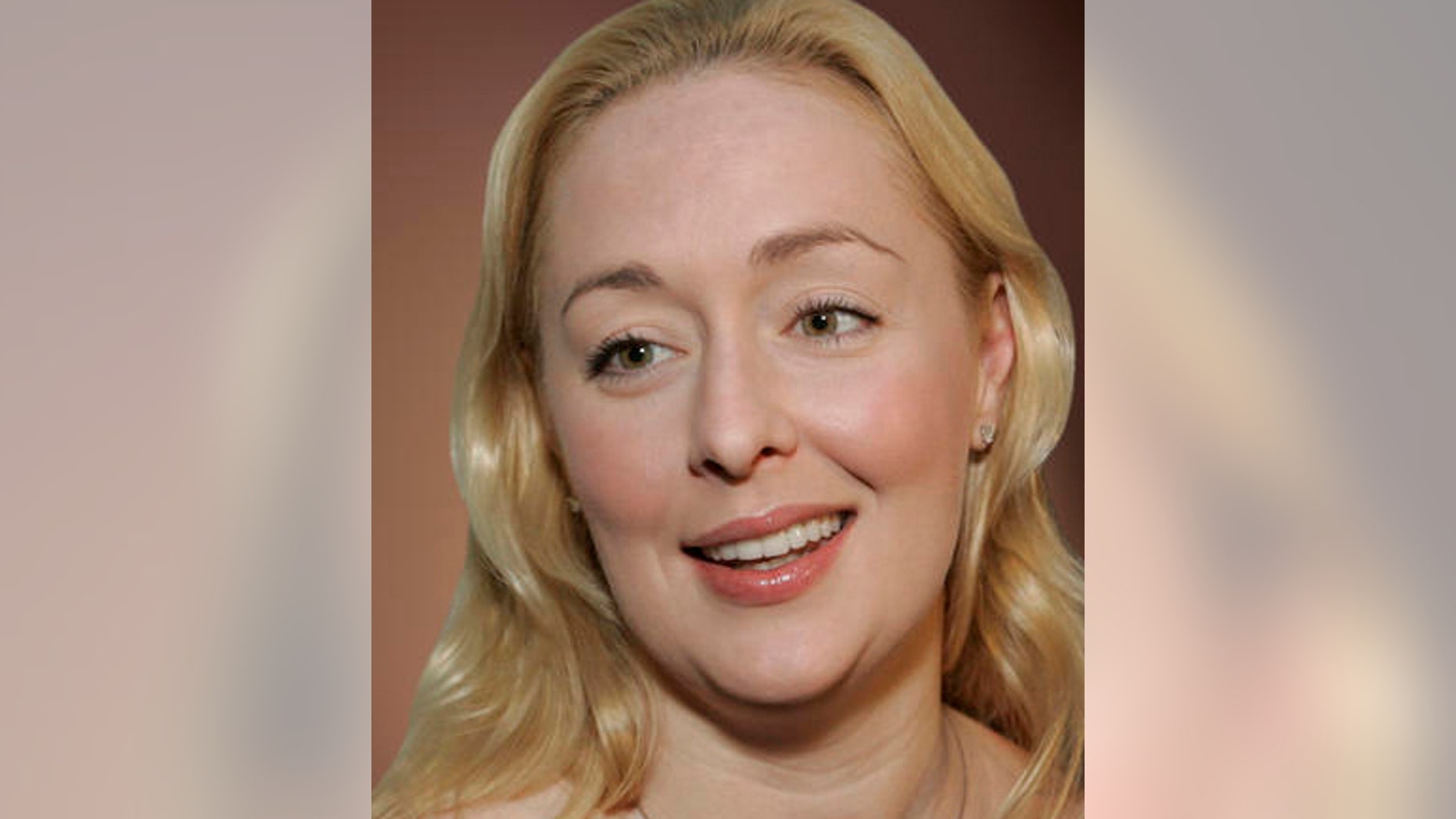 FILE: In this Aug. 22, 2006 file photo, country singer Mindy McCready answers questions outside the courtroom in Franklin, Tenn.