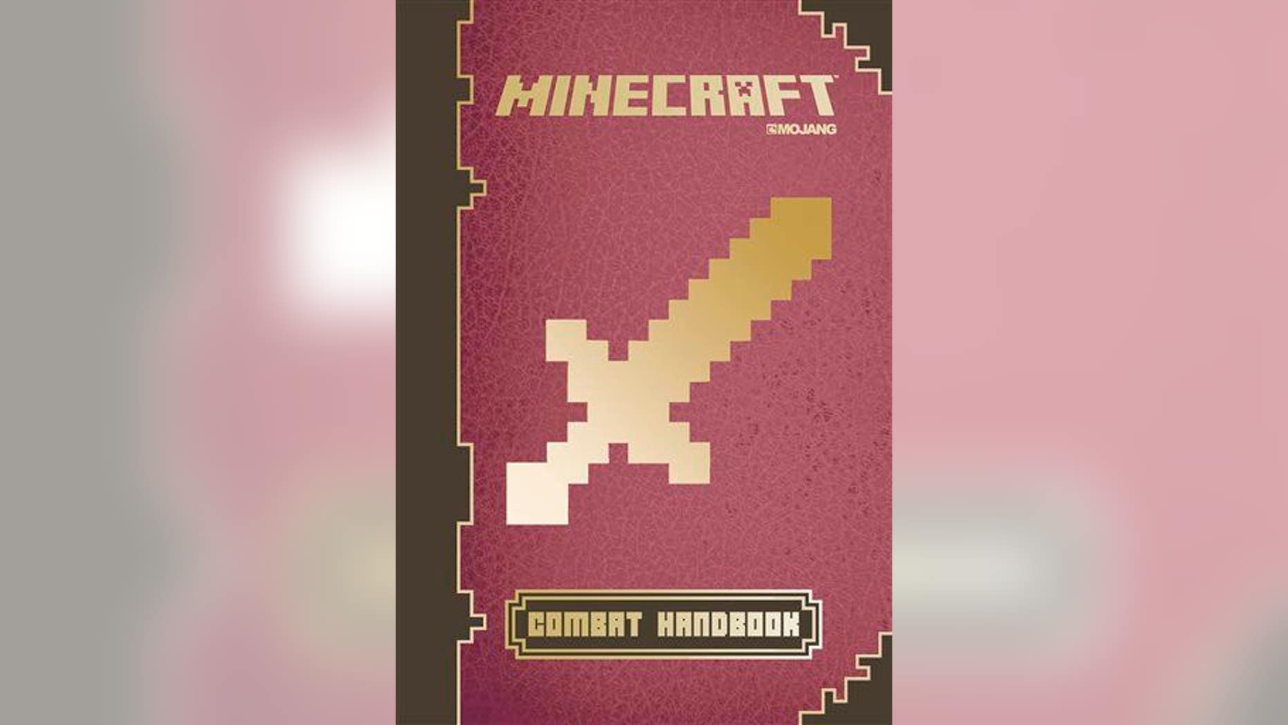 This photo provided by Scholastic shows the cover of the book "Minecraft: Combat Handbook."