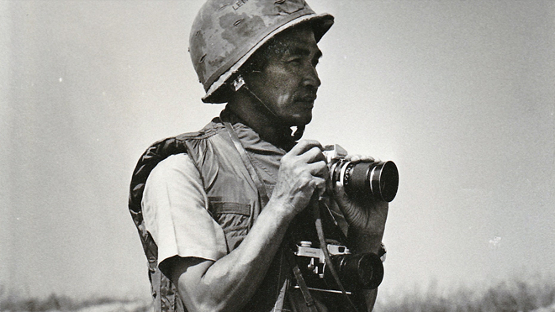 FILE 1972: Photo provided by Quynh Thai shows former Vietnamese photographer Le Minh Thai during the battle of An Loc in Vietnam during the war in Vietnam.