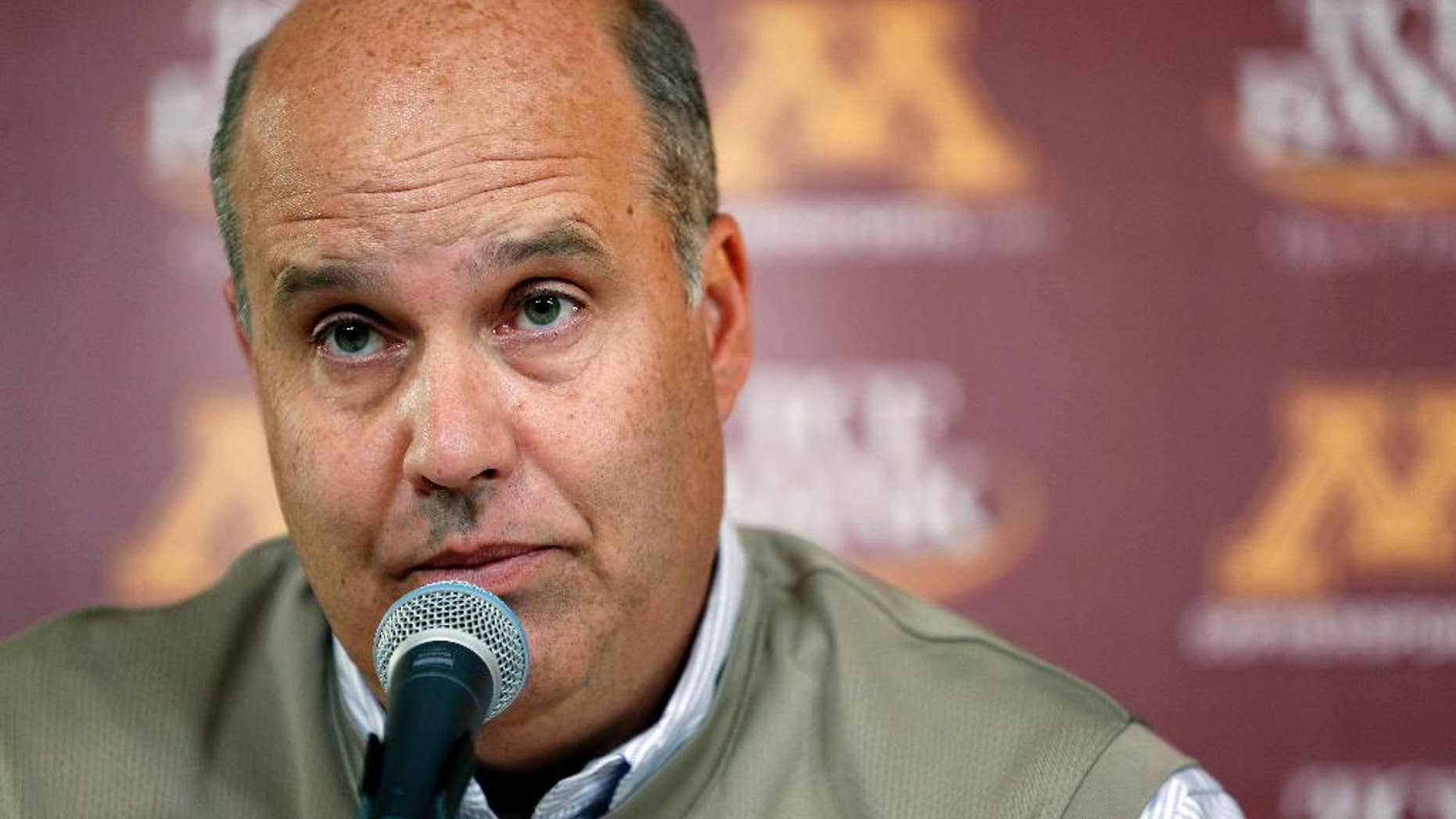 FILE - In this Oct. 10, 2013, file photo, Minnesota athletic director Norwood Teague speaks at a news conference in Minneapolis. The University of Minnesota announced Friday, Aug. 7, 2015, that Teague submitted his resignation after three years on the job. (Carlos Gonzalez/Star Tribune via AP, File)