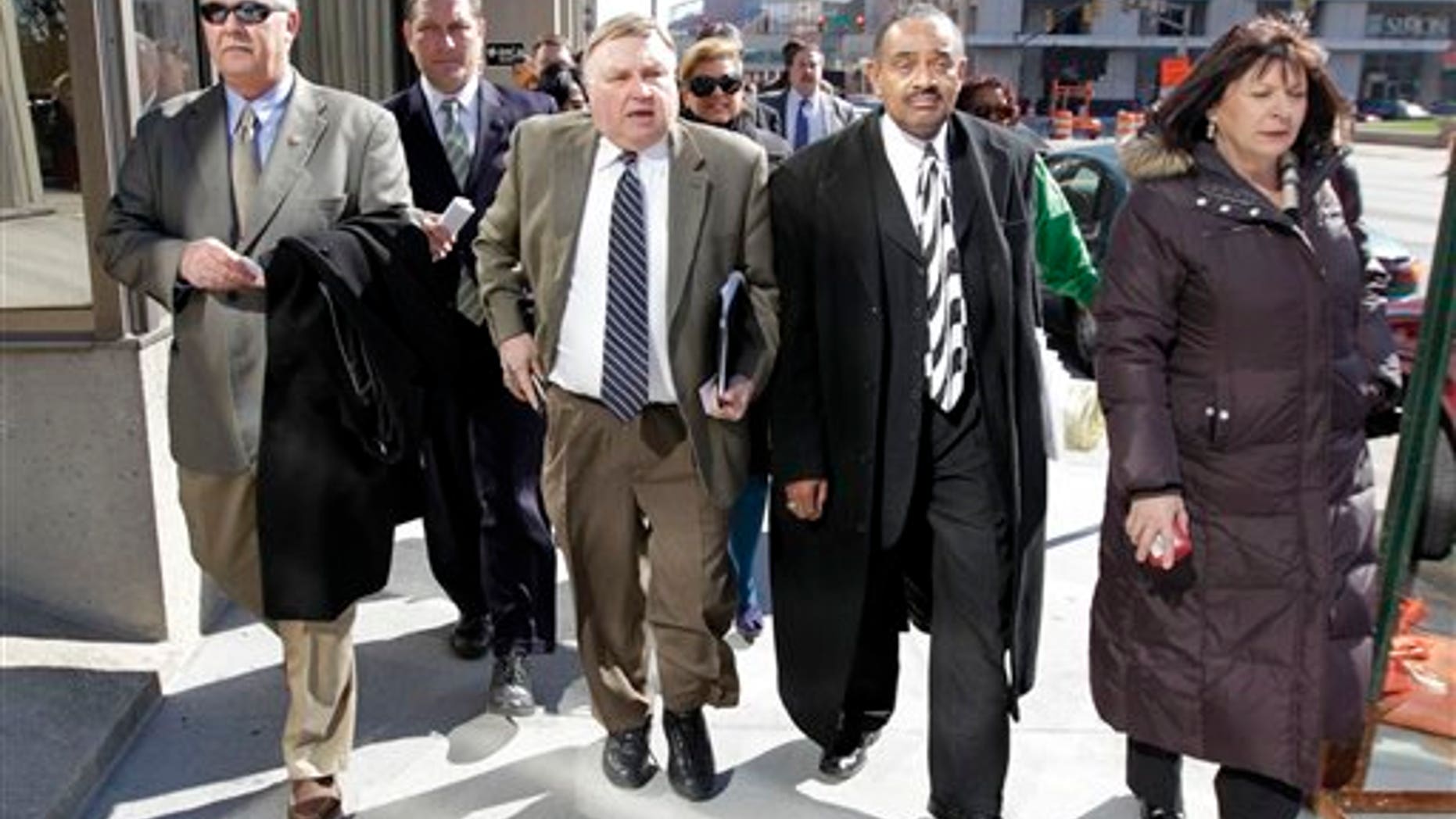 March 28: Minority Leader Pat Bauer walks with fellow Democrats while returning to the Statehouse in Indianapolis.