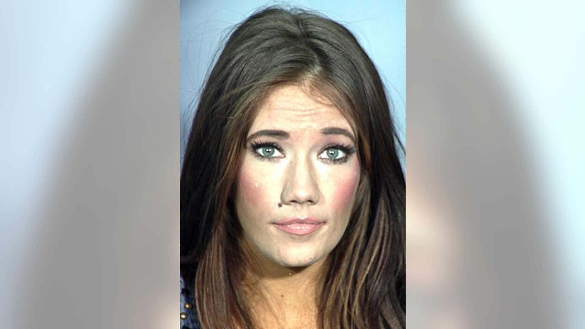 This undated law enforcement booking photo provided by the Las Vegas Metropolitan Police Department shows Katherine Nicole Rees. Rees, a former Nevada beauty queen who was stripped of her Miss Nevada USA title in 2006, was charged Monday, July 6, 2015, with allegedly selling and possessing methamphetamine.