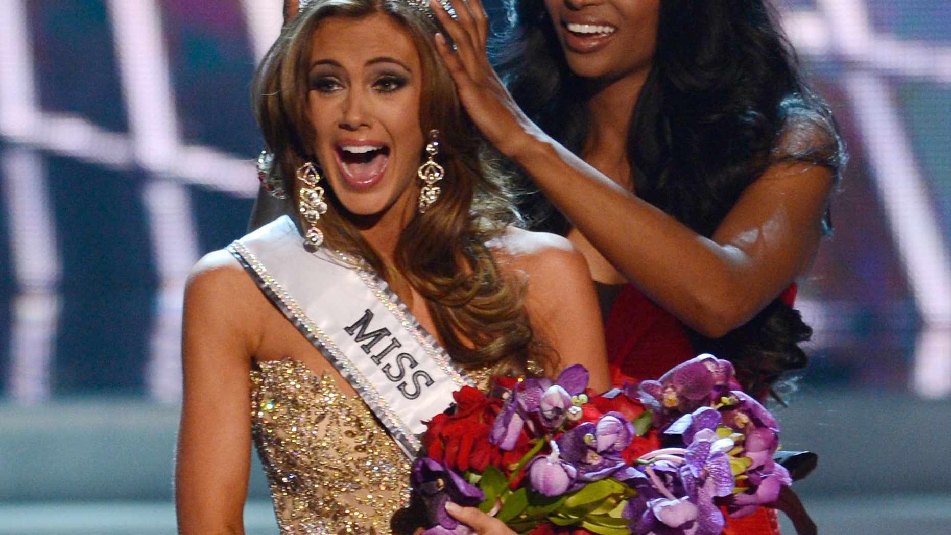 June 16, 2013. Miss Connecticut Erin Brady is crowned the winner of the Miss USA 2013 pageant by Nana Meriwether in Las Vegas. Brady, of South Glastonbury, Conn., relinquishes her crown Sunday, June 8, 2014, when the 2014 pageant competition being held in Baton Rouge, La., selects a new Miss USA.