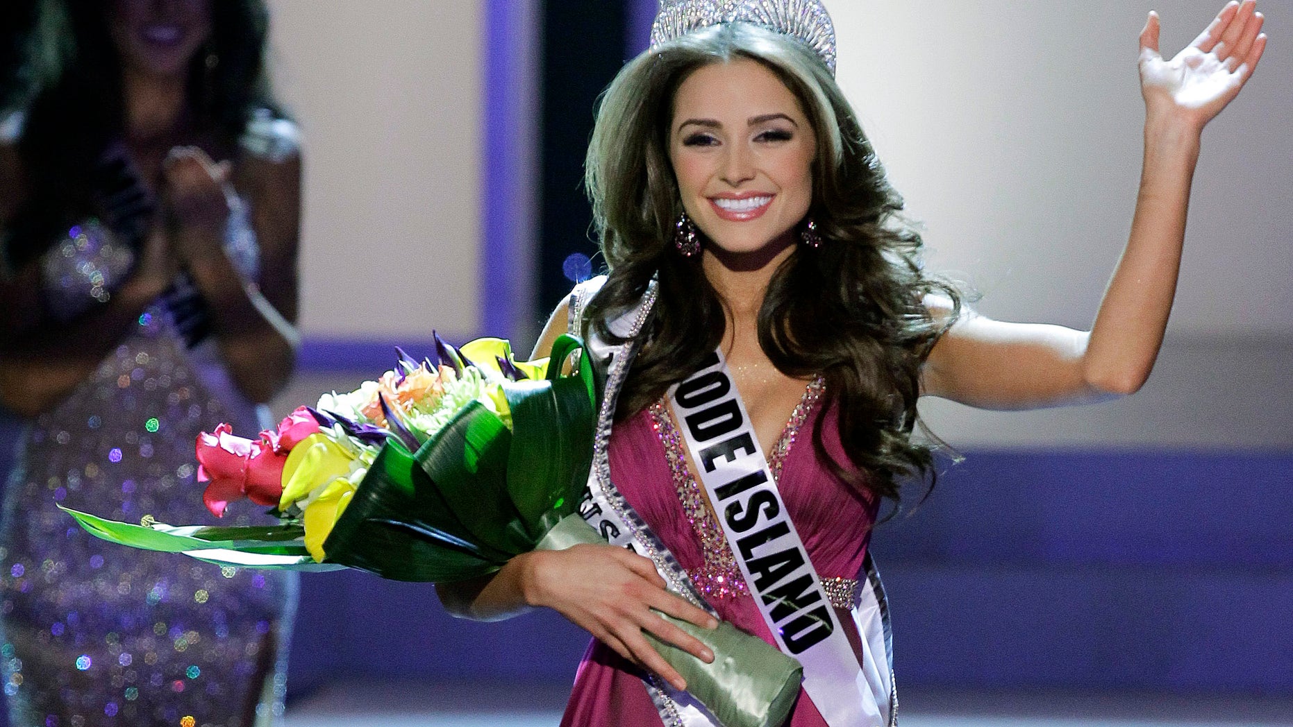 June 3, 2012: Miss Rhode Island Olivia Culpo waves to the audience after being crowned Miss USA during the 2012 Miss USA pageant.