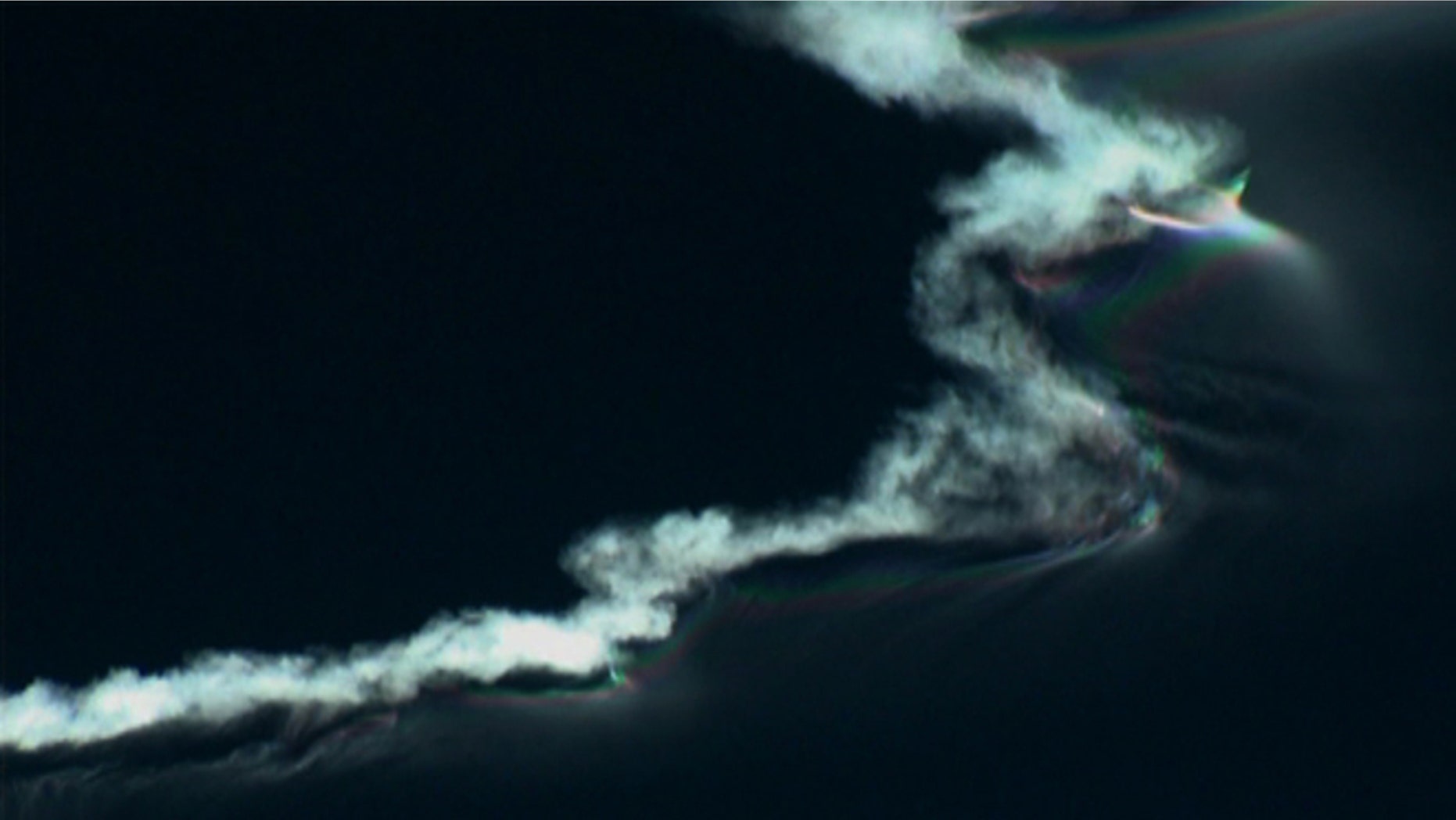 Sept. 13, 2012: The contrail of a Juno ballistic missile fired from Fort Wingate near Gallup, N.M., reflect early morning sunlight high above New Mexico.
