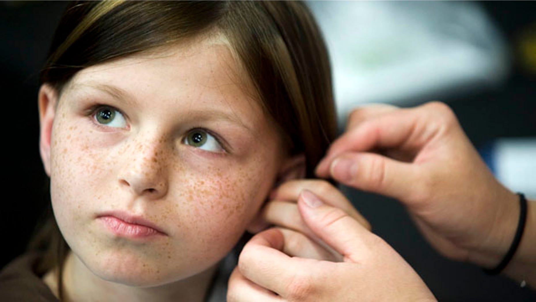 Battles with bone cancer left Zahra Clare Baker, 10, with hearing aids in both ears and a prosthetic leg. Her father and stepmother reported her missing Oct. 9, but recent evidence found at the Baker residence may now point to homicide.
