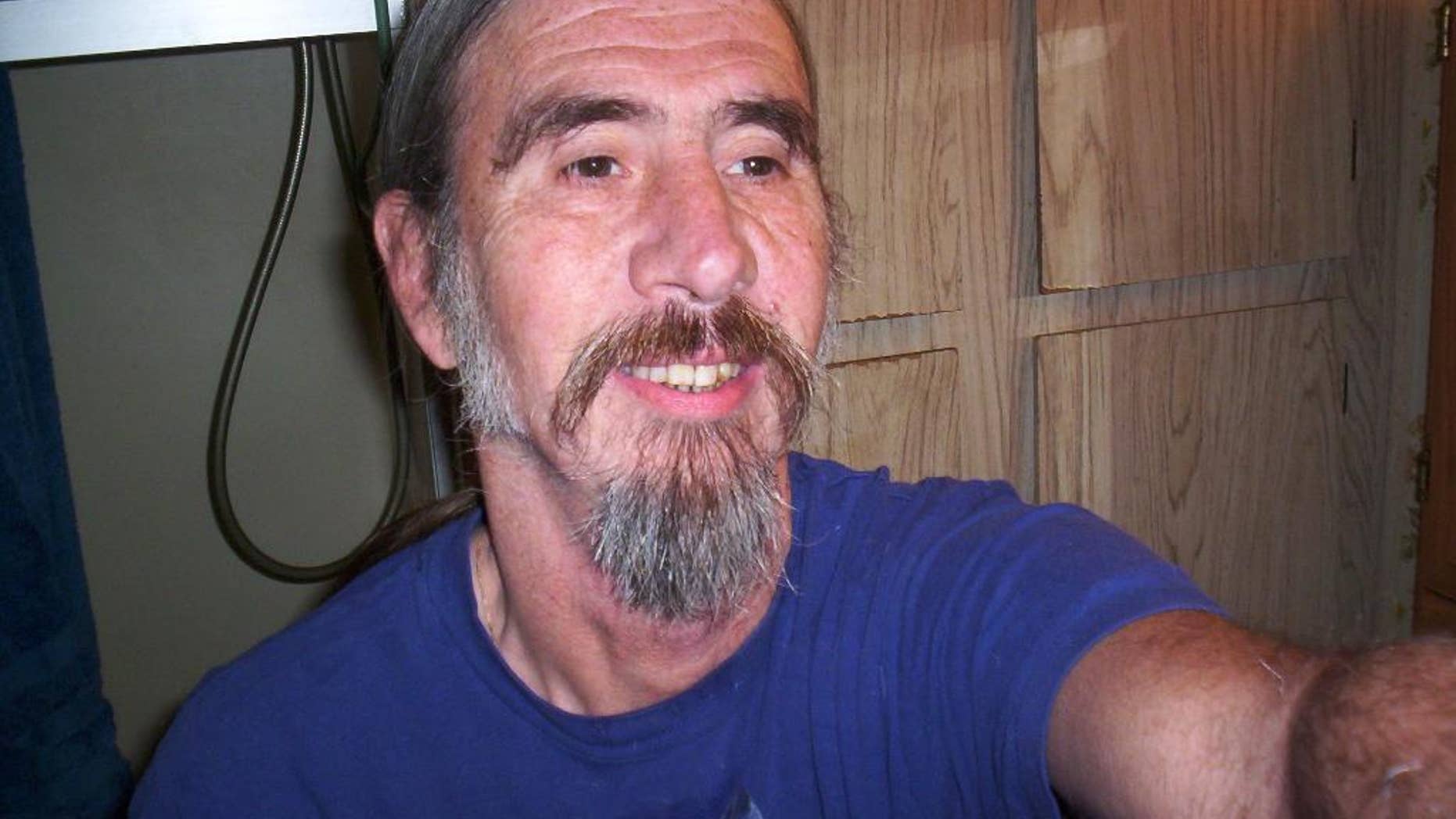 This undated photo provided by the Olympic National Park via friends of Jim Griffin shows Jim Griffin. Officials suspended a search for missing hiker Griffin in Olympic National Park in Washington state after no additional signs of the 60-year-old man were discovered over the weekend, a spokesperson said Monday, Dec. 29, 2014. (AP Photo/Courtesy Olympic National Park)