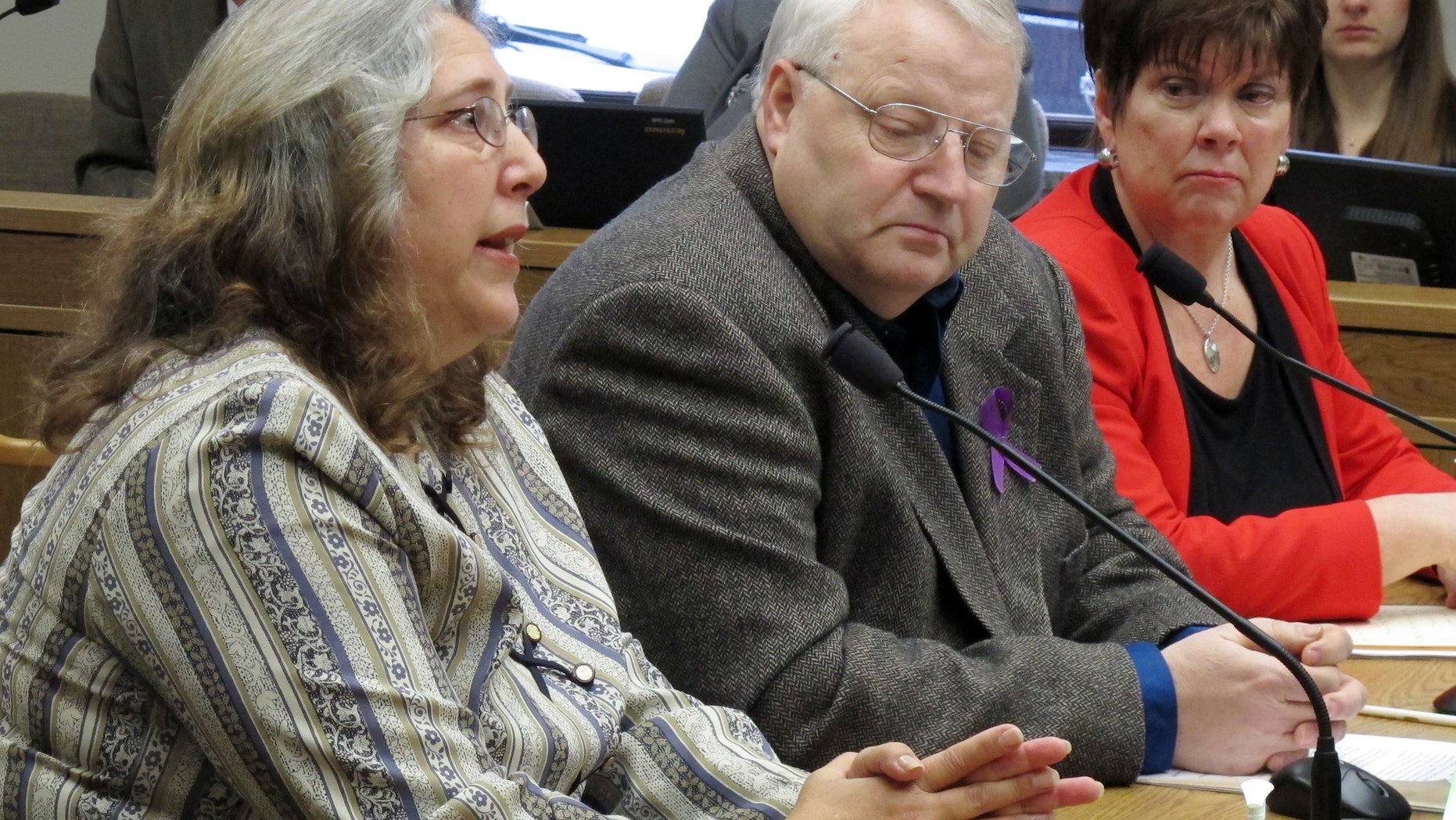 Feb. 1, 2013: Judy Cox, mother of missing Utah mother Susan Powell, testifies before a Senate committee as her husband, Chuck, center, and Sen. Pam Roach, right, listen in Olympia, Wash.
