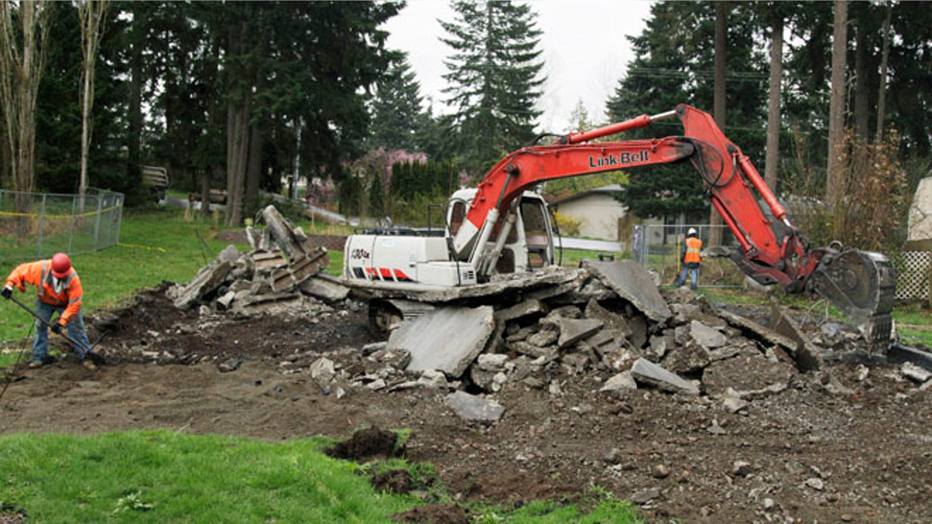 April 11: Demolition workers remove what is left of the fire-damaged home where Josh Powell killed himself and his two sons on Feb. 5, 2012. in Graham, Wash.