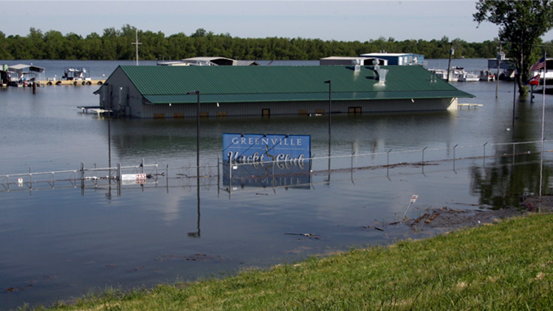 May 5: The rising waters of Lake Ferguson flood the Greenville Yacht Club and are forcing the evacuation of its neighbor the Lighthouse Point Casino, in Greenville, Miss.