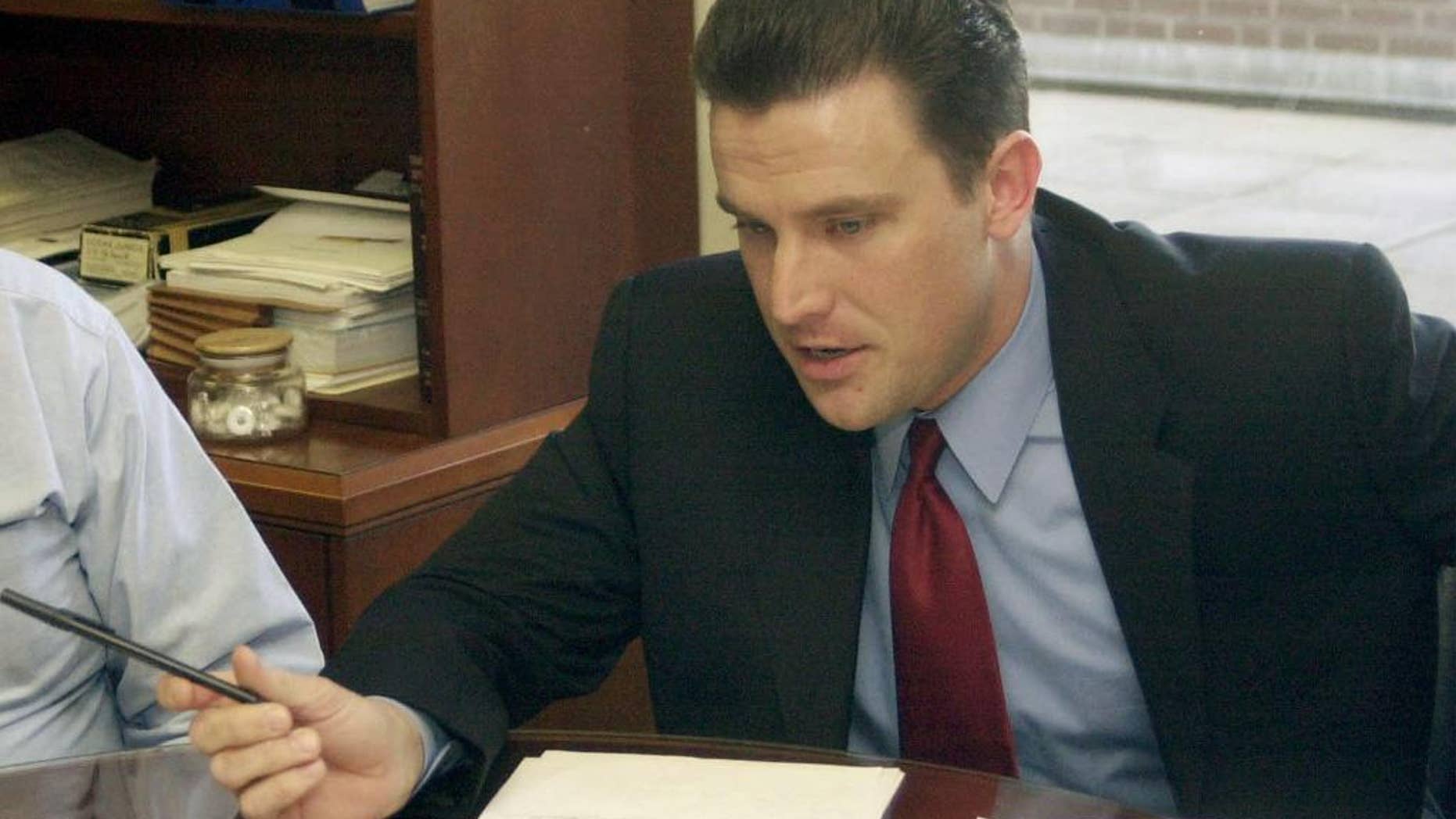 FILE - In this Jan. 24, 2002 photo is Robert "Spence" Jackson in Jefferson City, Mo. Jefferson City police said Monday, March 30, 2015 that Jackson, a spokesman for Missouri Auditor Tom Schweich, has died from an apparent self-inflicted gunshot wound, a month after the state auditor also killed himself. (AP Photo/Kelley McCall, File)