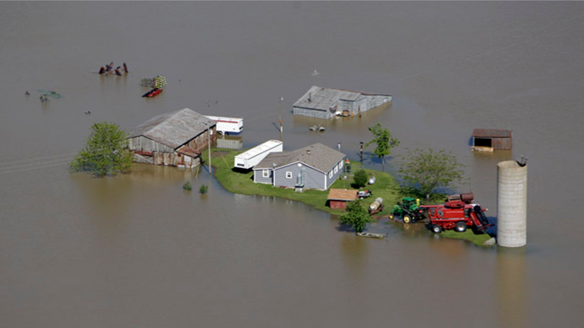 May 3: A farm is seen surrounded by floodwater near New Madrid, Mo.