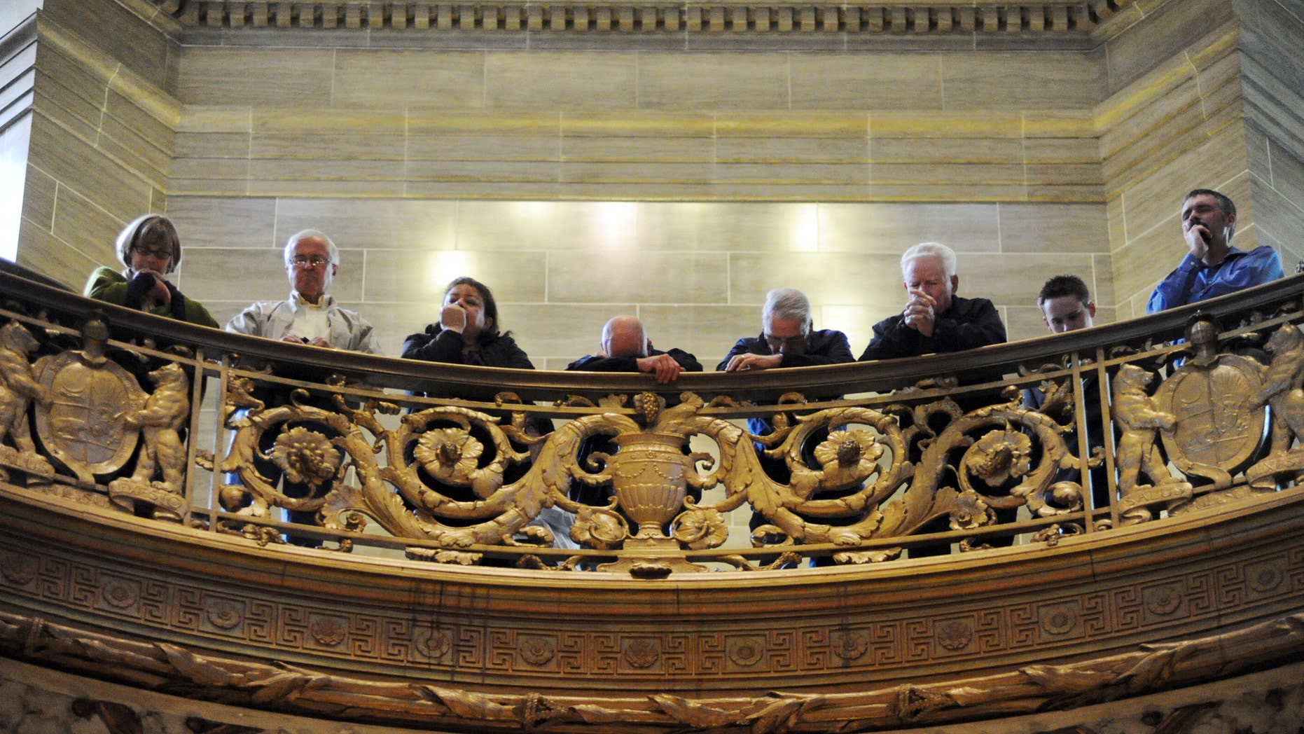 March 29, 2010: Participants in the "Show Me Your Glory Lord!" service pray in the State Capitol in Jefferson City, Mo.