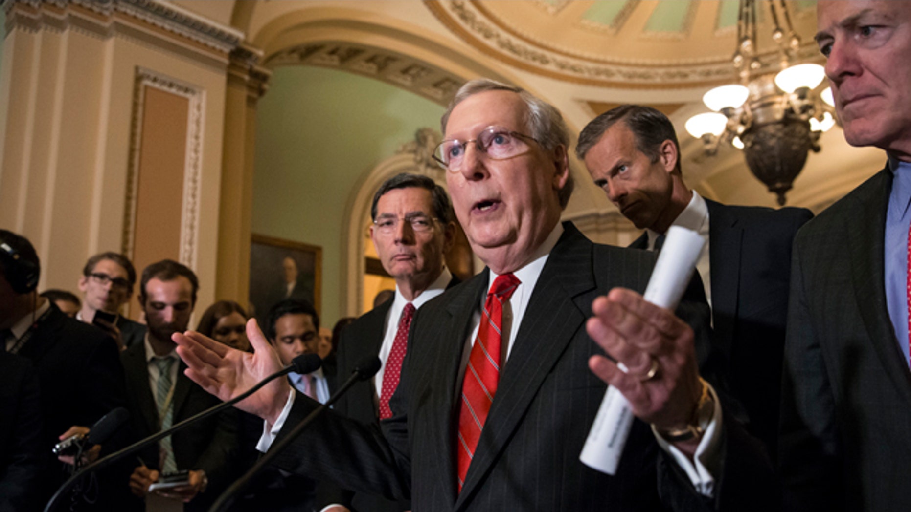 Senate Majority Leader Mitch McConnell of Ky., joined by, from left, Sen. John Barrasso, R-Wyo., Sen. John Thune, R-S.D., and Senate Majority Whip John Cornyn of Texas, faces reporters' questions on controversial statements by Republican presidential candidate Donald Trump, Tuesday, June 7, 2016, during a news conference on Capitol Hill in Washington following a closed-door policy meeting. McConnell called on his party's presumptive nominee to quit scrapping with various minority groups and "get on message" in order to win the White House. (AP Photo/J. Scott Applewhite)