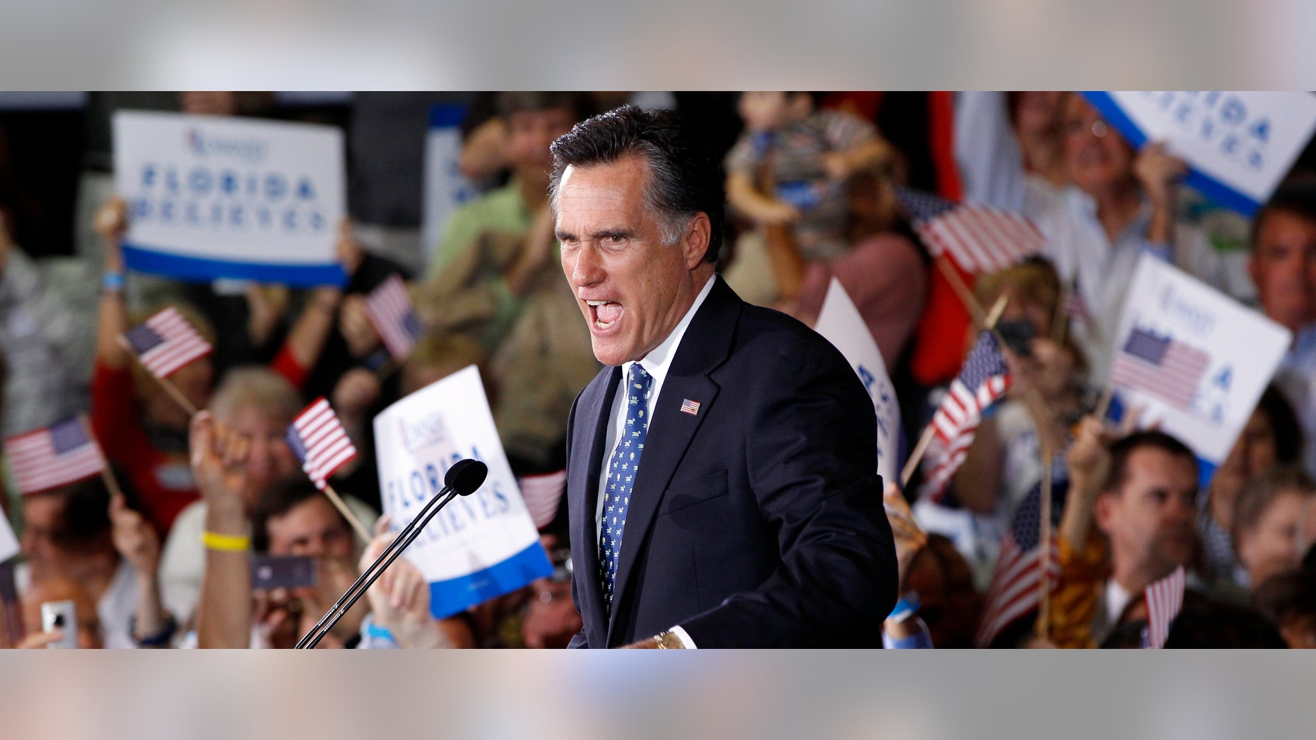 Republican presidential candidate, former Massachusetts Gov. Mitt Romney, celebrates his Florida primary election win at the Tampa Convention Center in Tampa, Fla., Tuesday, Jan. 31, 2012. (AP Photo/Charles Dharapak)