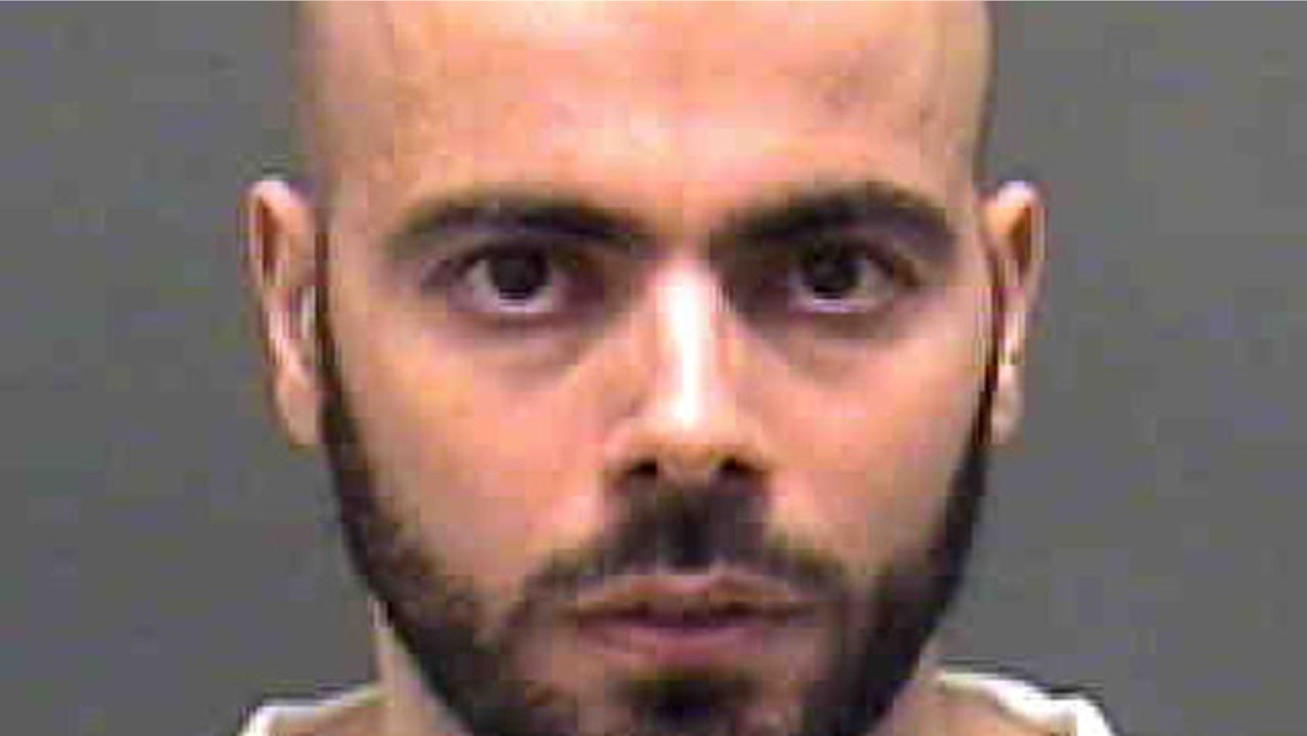 An undated photo provided by the Mecklenburg County, N.C. Sheriff's Office shows Mohamad Hammoud. On Jan. 27 Federal Judge Graham Mullen knocked more than 100 years off the sentence of Hammoud, the first man convicted under a key terror-fighting legal strategy.