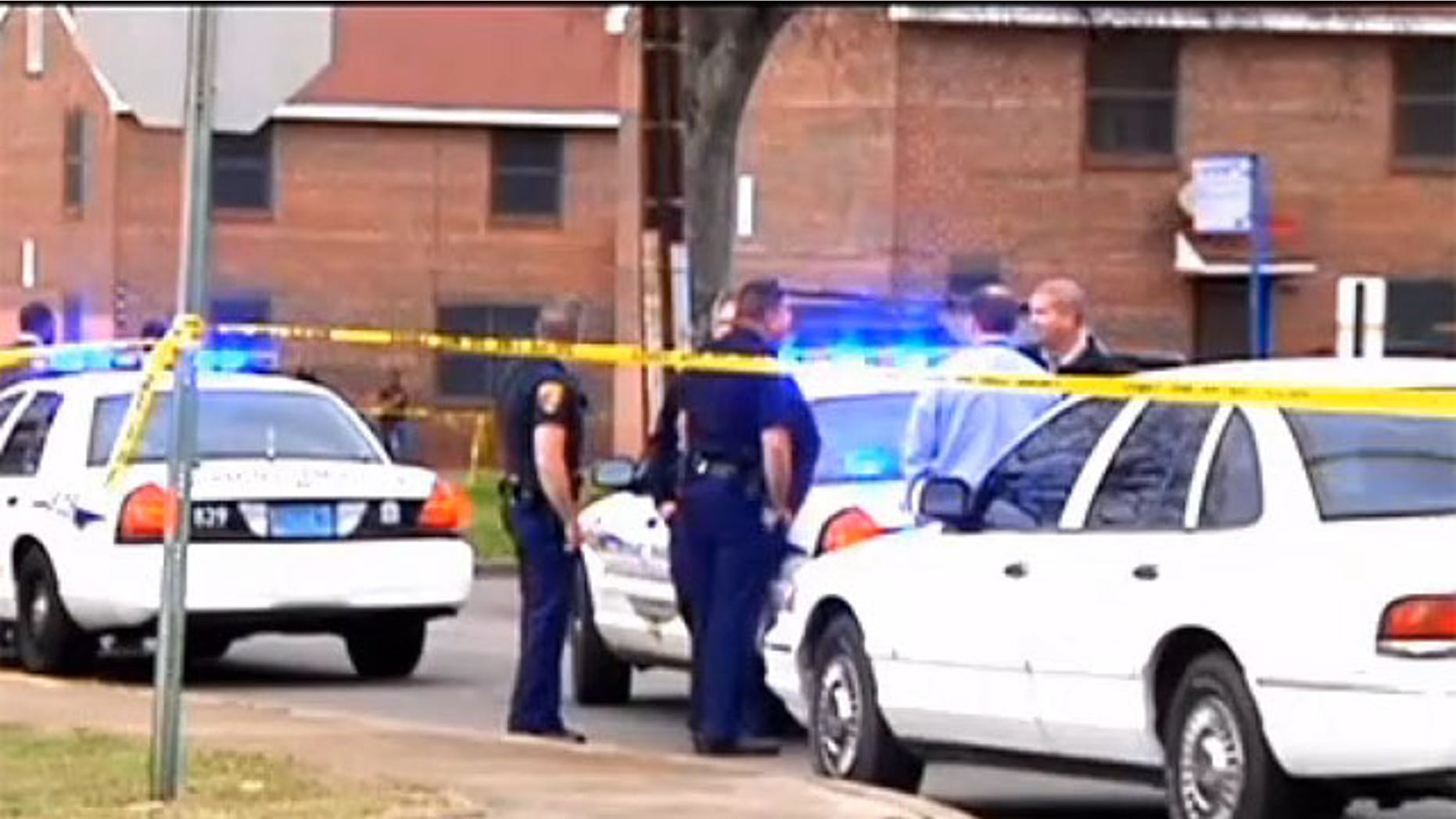 April 29, 2013: Police respond to the scene after a Birmingham woman was shot dead while holding her infant.