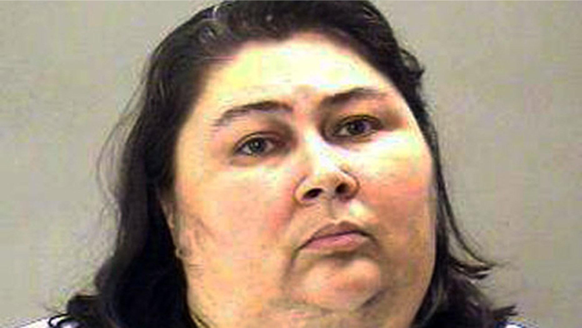 This undated booking photo provided by the Dallas County Sheriff Department shows Tina Marie Alberson, 44.