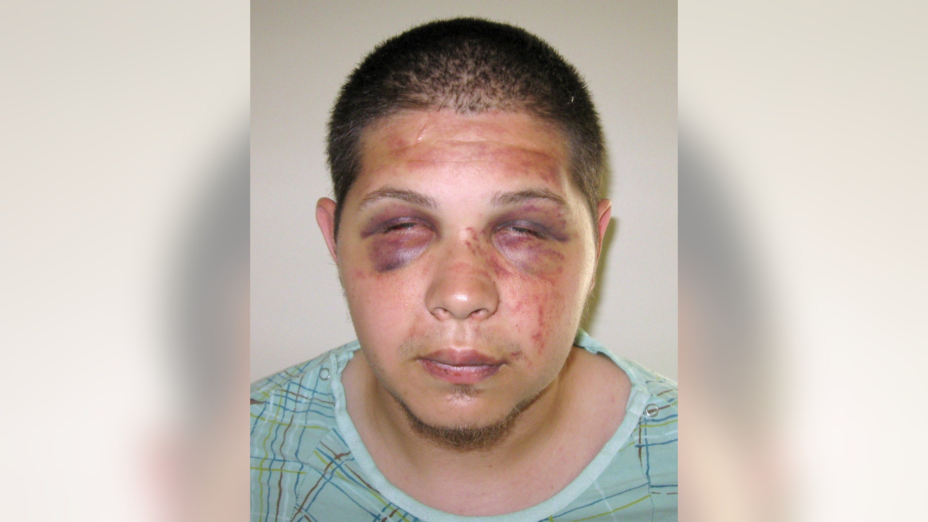 This booking photo released Wednesday, July 8, 2015, by the Middletown, Conn., Police Department shows Tony Moreno, who police said admitted to tossing his 7-month-old son Aaden Moreno Sunday night, July 5, from the Arrigoni Bridge near Middletown, Conn. Moreno, 21, was arraigned on murder charges Wednesday, a day after the child's body was pulled from the Connecticut River downstream. (Middletown Police Department via AP)