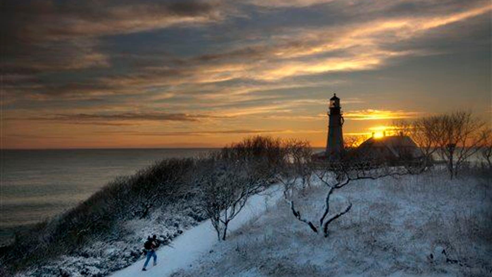 Clearing skies await photographer looking for a spot to capture the early-morning light in Cape Elizabeth, Maine.