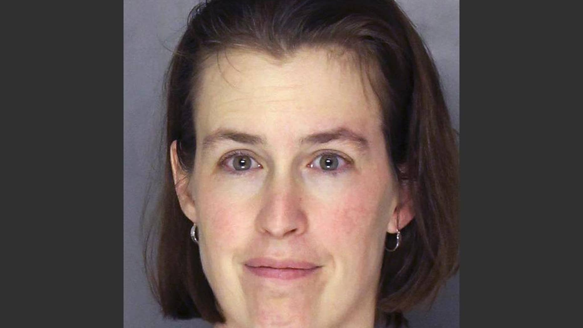 FILE - This Tuesday, April 1, 2014 file booking photograph released by the Allegheny County Police shows Laurel Michelle Schlemmer, who is charged with drowning her 3-year-old son and leaving his 6-year-old brother in critical condition Tuesday, April 1 after she allegedly pushed the boys underwater in a bathtub, then sat on them at their McCandless, Pa. home. Daniel Schlemmer, 6, has died, four days after his younger brother drowned, the Allegheny County Medical Examiner's Office confirmed Saturday, April 5, 2014. (AP Photo/Allegheny County Police, File)
