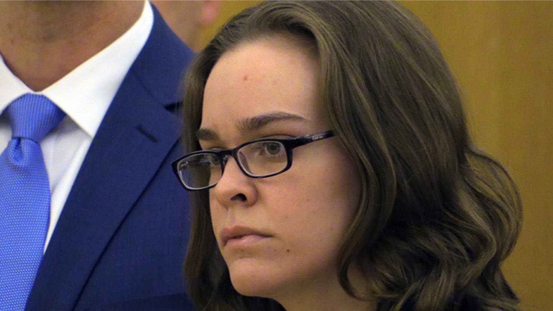 April 8, 2015: Lacey Spears looks towards Judge Robert Neary during her sentencing onat the Westchester County Courthouse in White Plains, N.Y. Spears, convicted of killing her son by poisoning him with salt, has been sentenced to 20 years to life in prison. (AP Photo/The Journal News, Joe Larese, Pool)