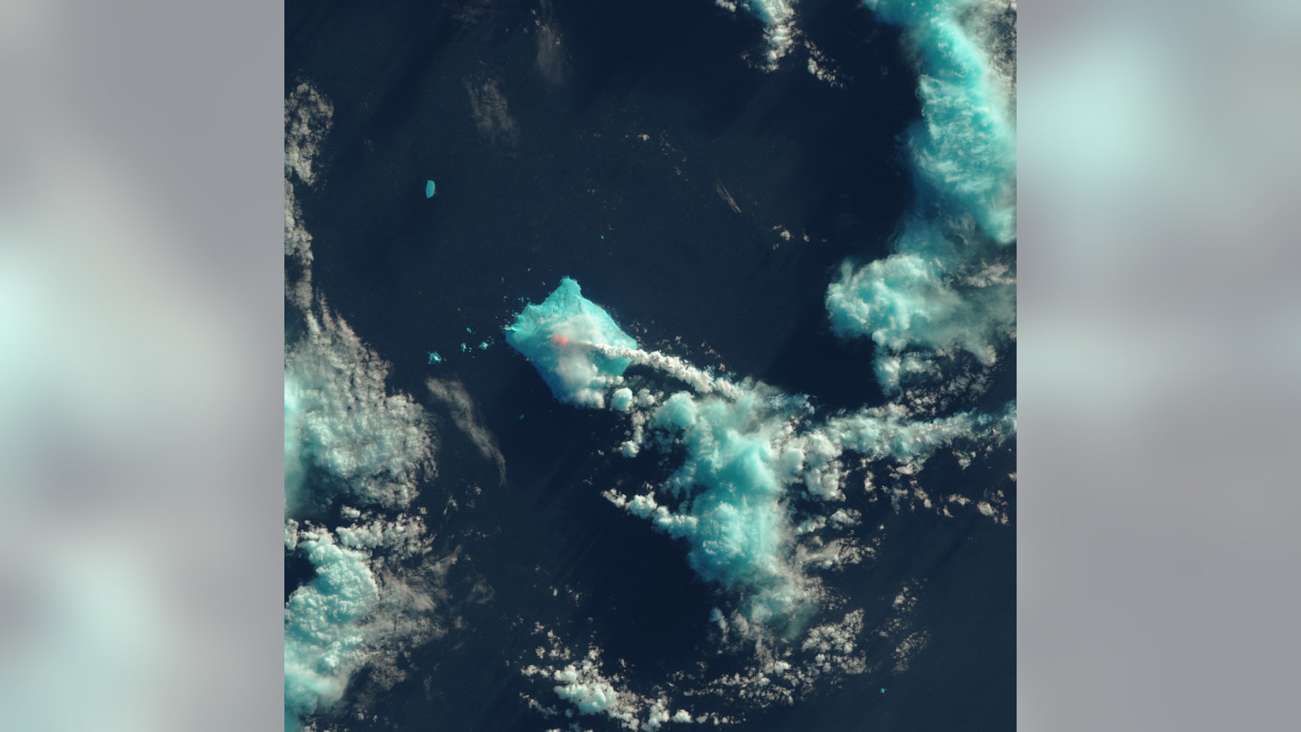 Nobody lives near Mount Sourabaya, but a NASA satellite captured its eruption in the South Atlantic in this false-color image.