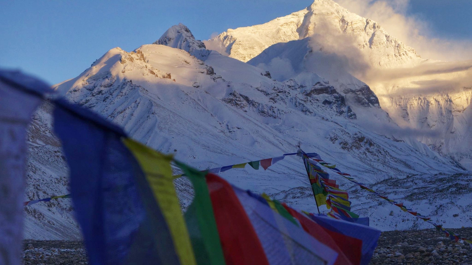 This undated photo provided by Alpenglow Expeditions, Mount Everest is seen from a base camp on the northern Tibetan side of the mountain.