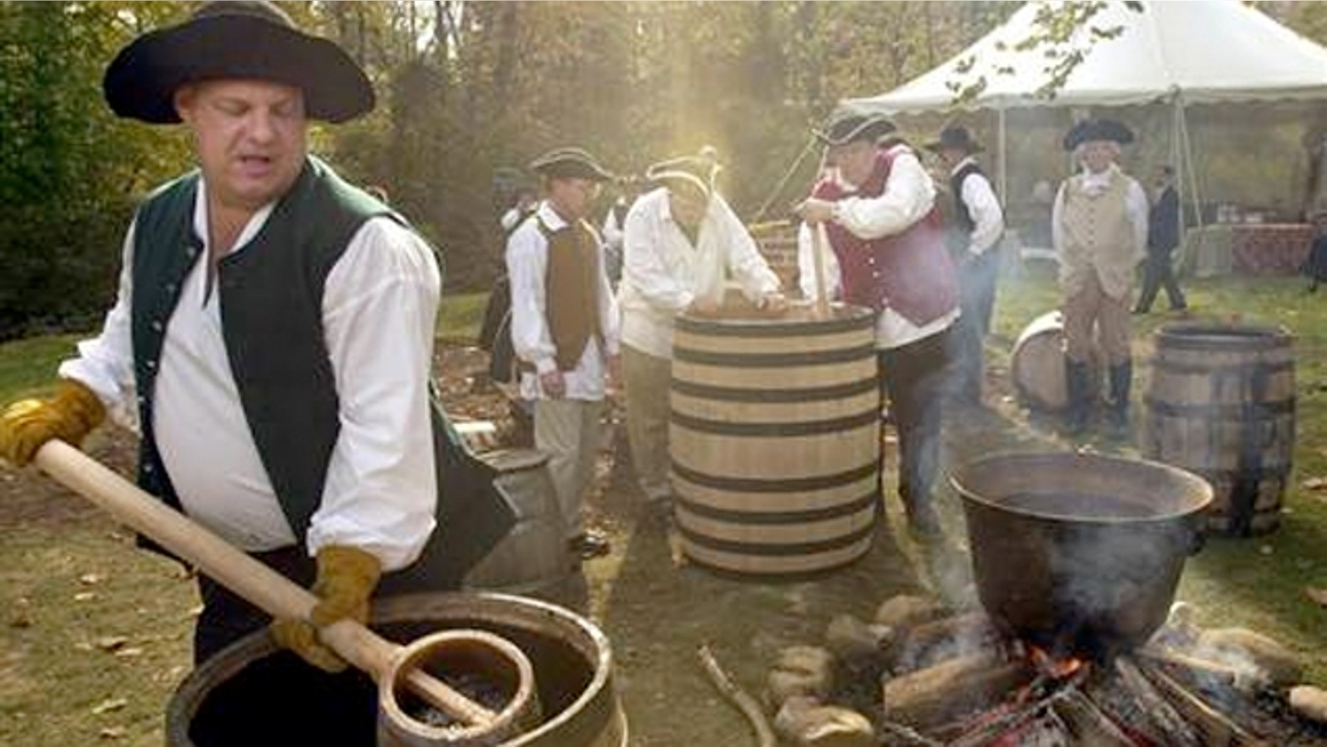 Master distillers at Mount Vernon's Gristmill and Distillery