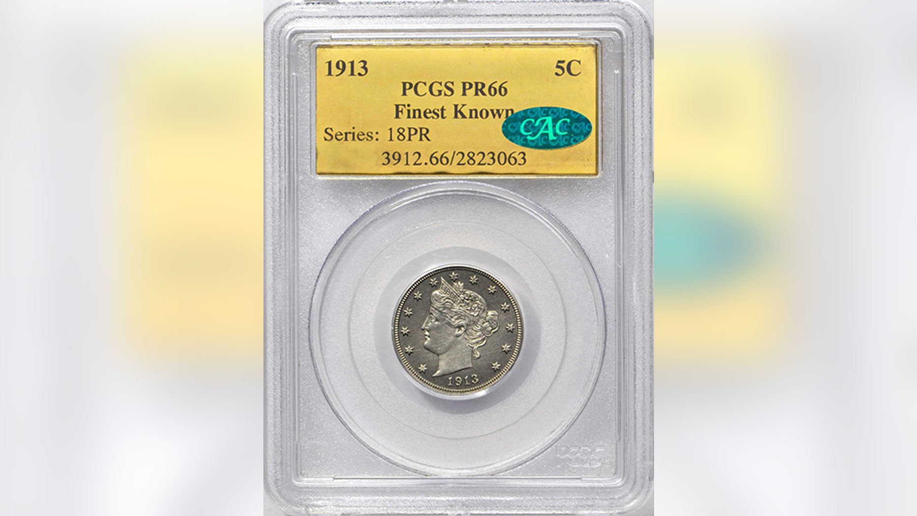 The Eliasberg 1913 Liberty Head nickel up for auction in Philadelphia fetched almost $5 million from an anonymous buyer Wednesday. The coin is named for financier Louis E. Eliasberg, who bought the coin in 1948, and amassed one of the greatest coin collections in U.S. history. (Stack’s Bowers Galleries via AP)