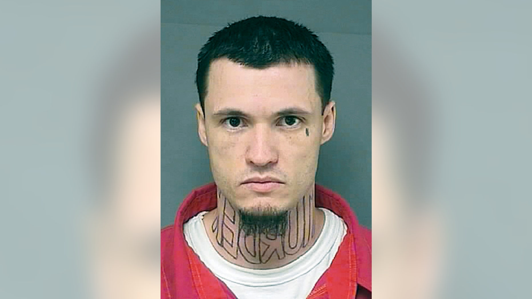 This undated booking photo shows Jeffrey Chapman, charged with first-degree murder. Chapman is afraid the tattooed mirror-image letters spelling out the word "murder" across his neck might prejudice a jury, so he is asking for a professional tattoo artist to remove or cover it up. Prosecutors say they aren't opposed to Chapman covering his tattoo, but Barton County's sheriff says he's against transporting Chapman to a licensed tattoo facility — the only places tattoo artists are allowed to practice under Kansas law. The Great Bend Tribune reports Chapman's trial is scheduled to start Monday, April 28, 2014, in the November 2011 killing of Damon Galliart, whose body was found by hunters in a roadside ditch southwest of Great Bend. (AP Photo/The Great Bend Tribune)