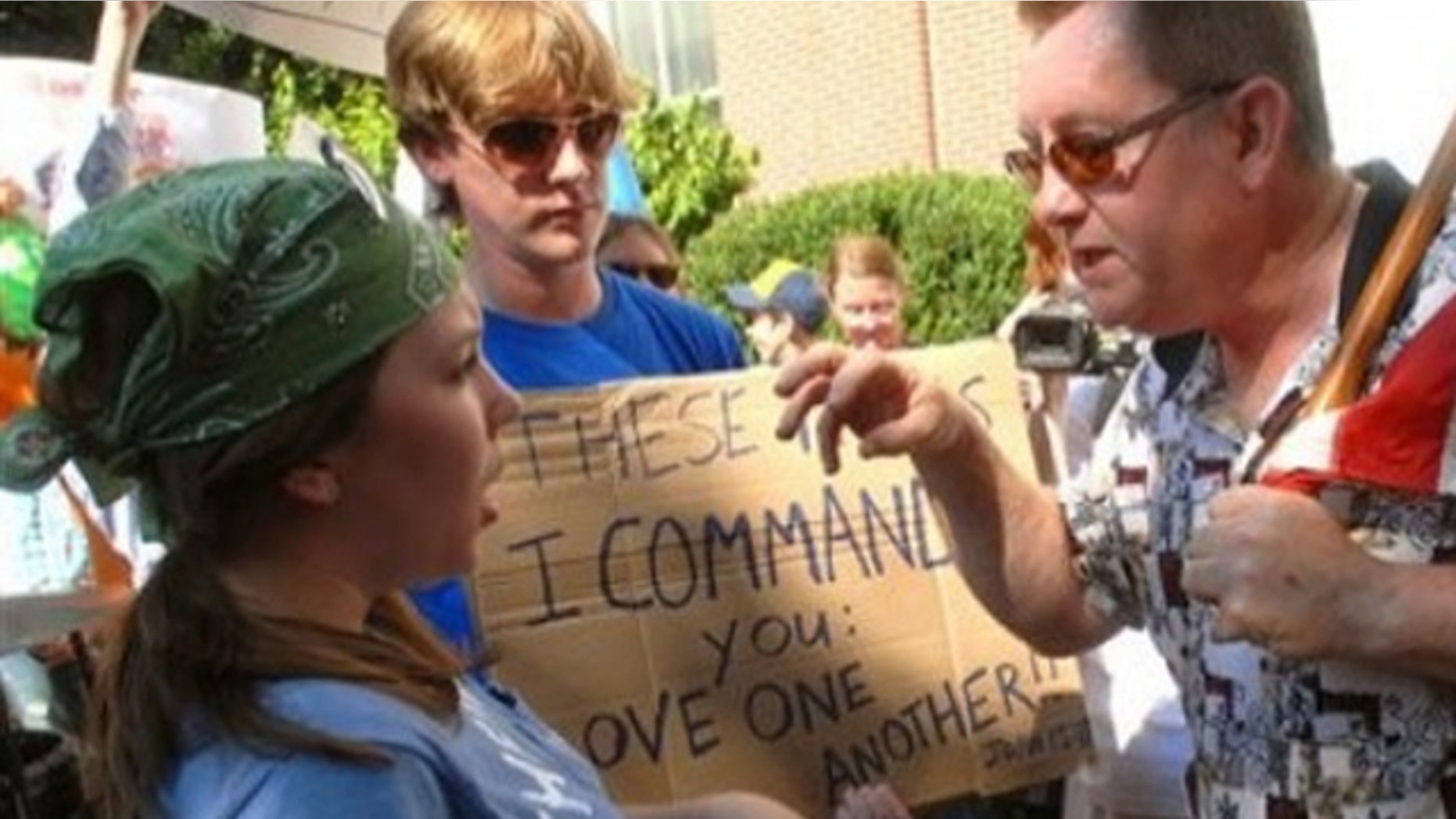 July 14, 2010: Mosque protester Greg Johnson, right, and counter protester Ina Marshall and Tim Foster argue in front of the Rutherford County Courthouse in Murfreesboro, Tenn., about a planned mosque and Islamic community center.