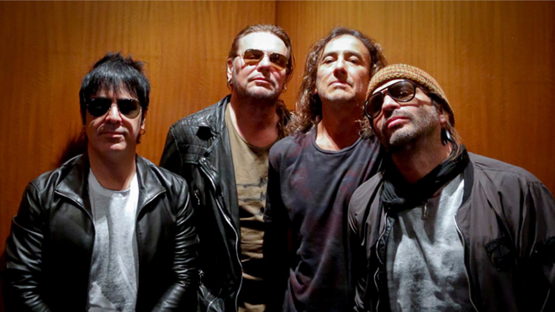 Members of the Mexican rock band ManÃÂ pose during an interview in New York.